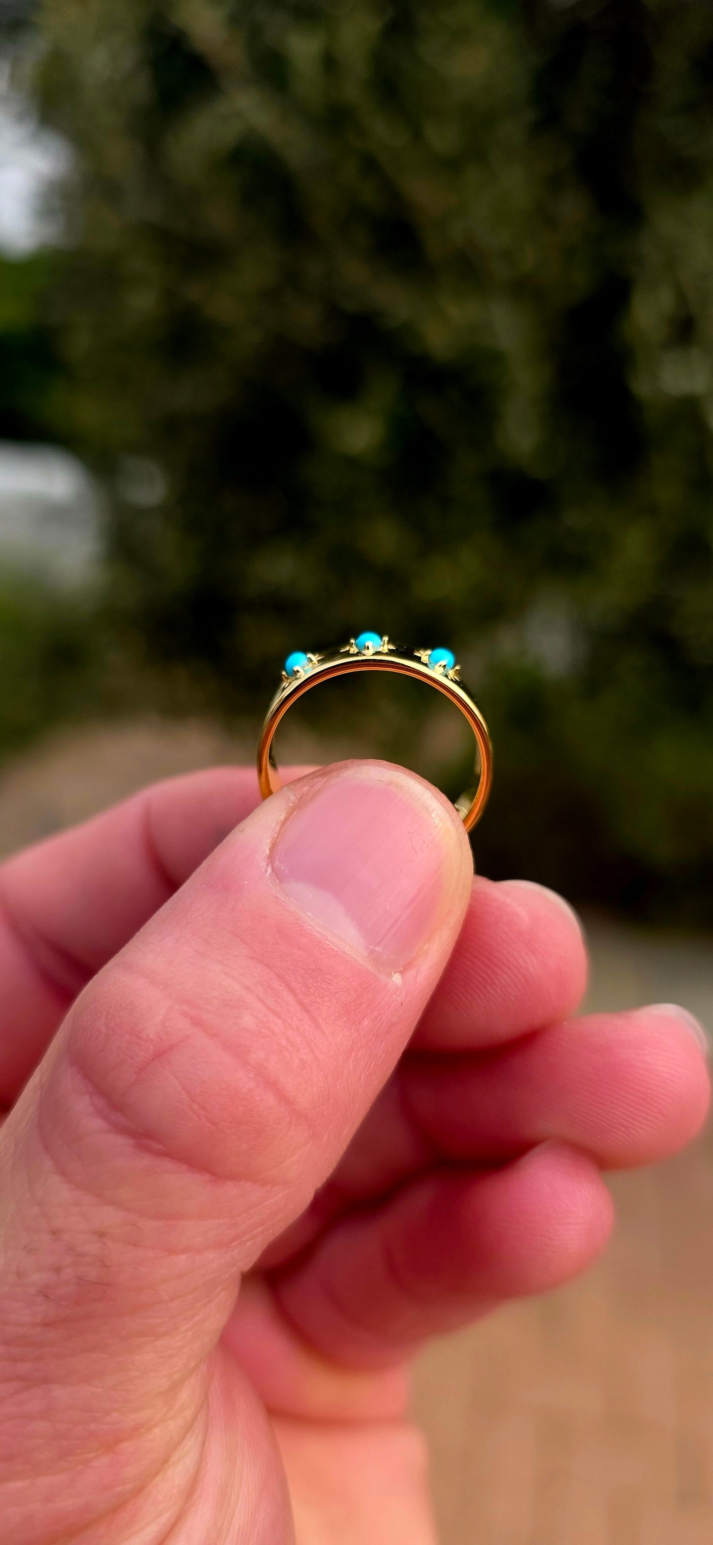 Quietly powerful, this unisex gypsy-style band has that wonderful old-world character with a bold pop of turquoise blue.