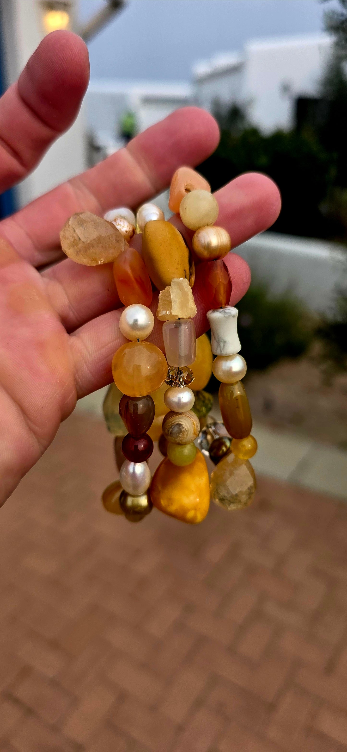 All the glorious colours of autumn wrapped around your wrist!  A fabulous collection of three chunky gemstone stretch bracelets, individually strung with an eclectic mix of natural gemstones in warm honey, caramel, cognac, golden yellow and earthy brown.