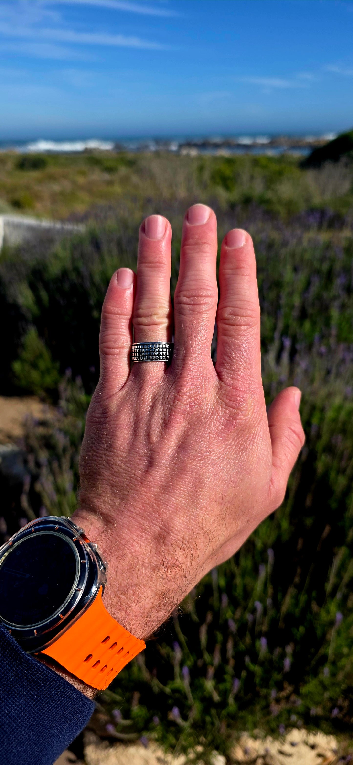 Modern, graphic and UNISEX! This solid sterling silver band features a fabulous all-over engraved brickwork/grid design, giving the ring a wonderfully architectural, almost industrial feel.