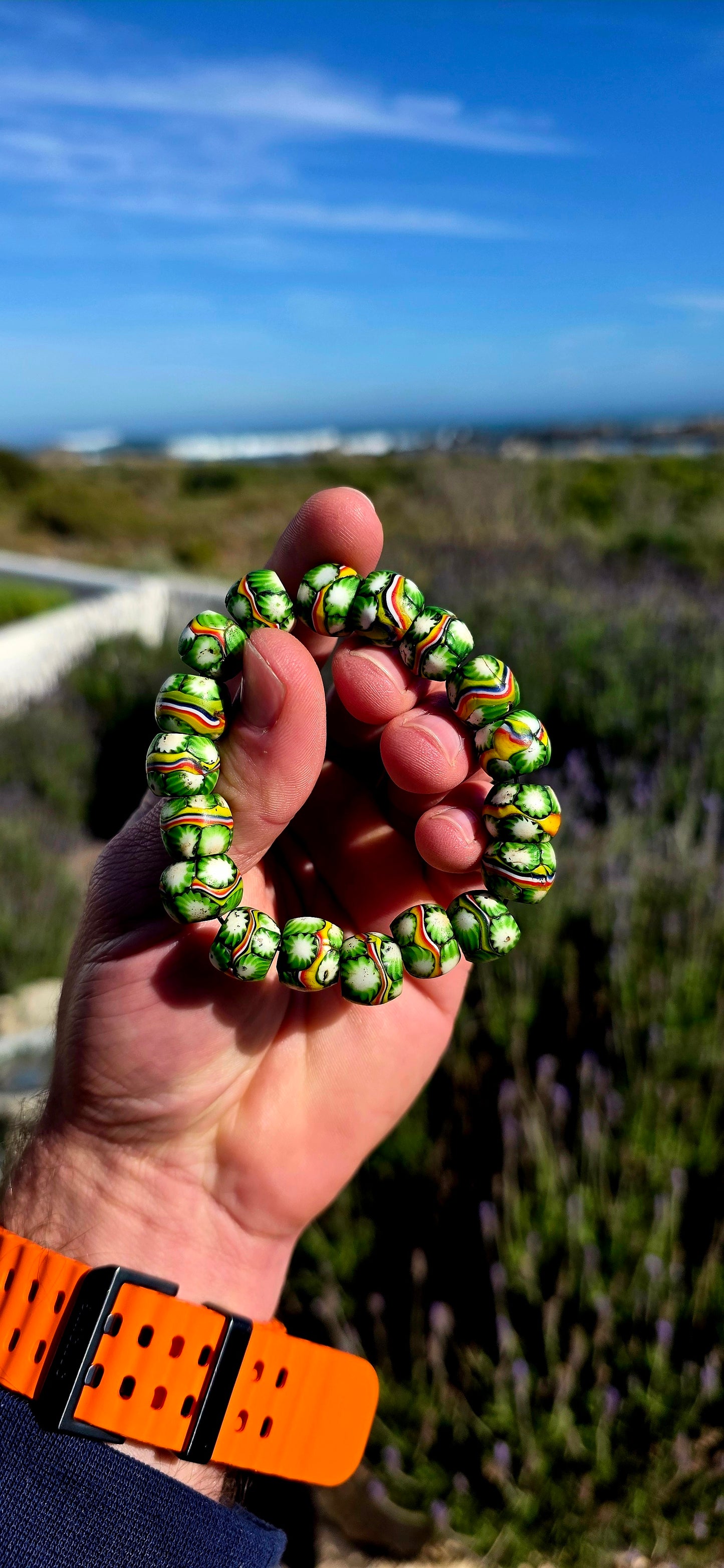 A fabulous piece of African trade history! This chunky stretch bracelet is strung entirely with antique Venetian millefiori / murrine glass trade beads dating back to the late 19th century.