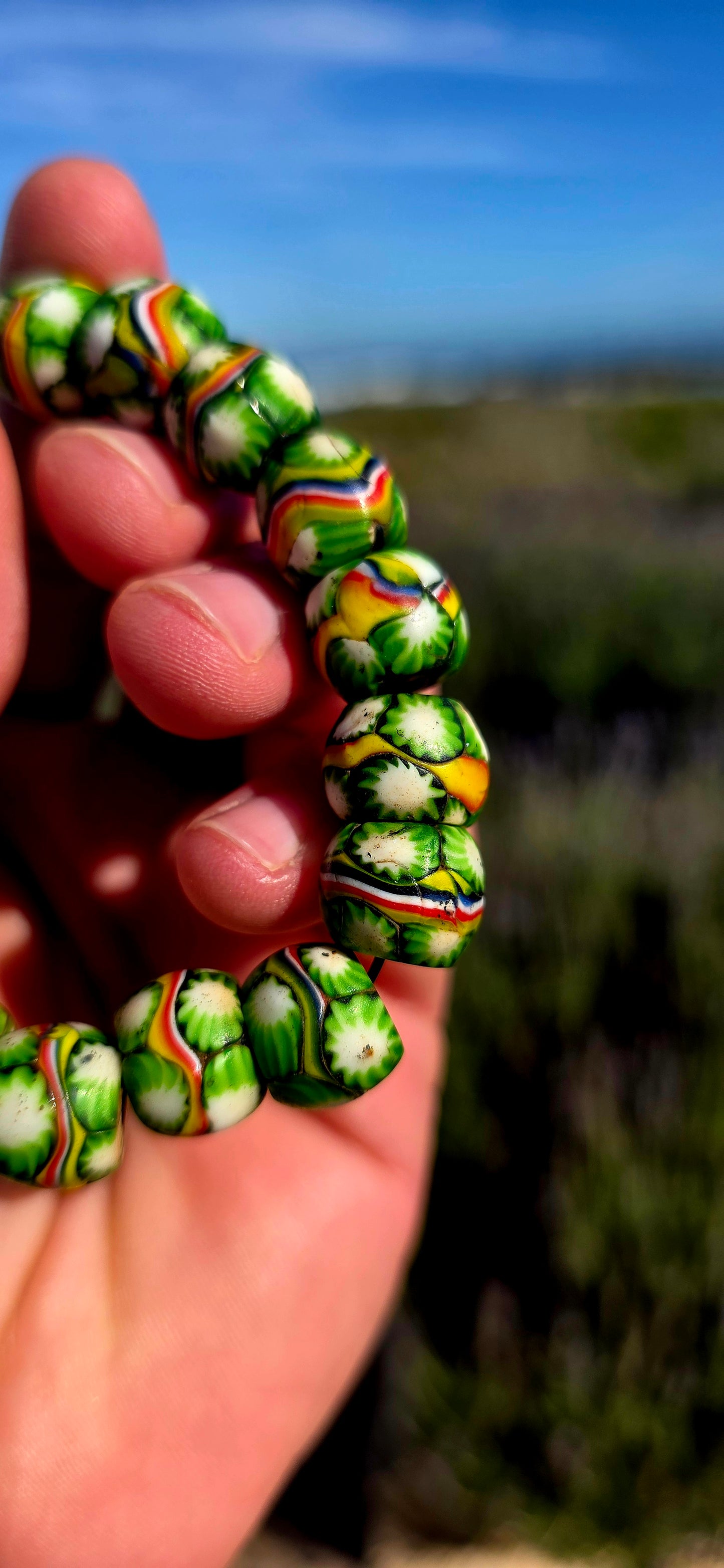 A fabulous piece of African trade history! This chunky stretch bracelet is strung entirely with antique Venetian millefiori / murrine glass trade beads dating back to the late 19th century.