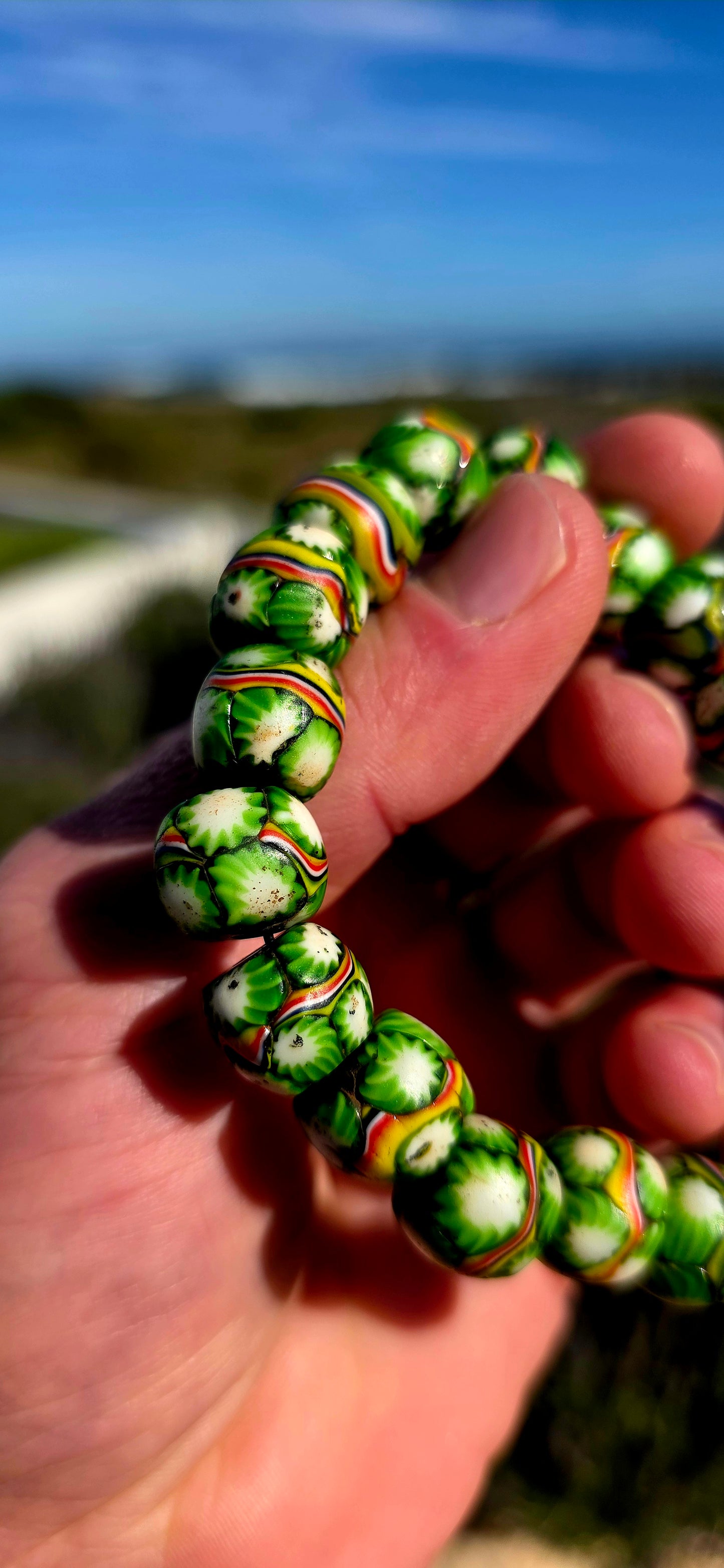 A fabulous piece of African trade history! This chunky stretch bracelet is strung entirely with antique Venetian millefiori / murrine glass trade beads dating back to the late 19th century.