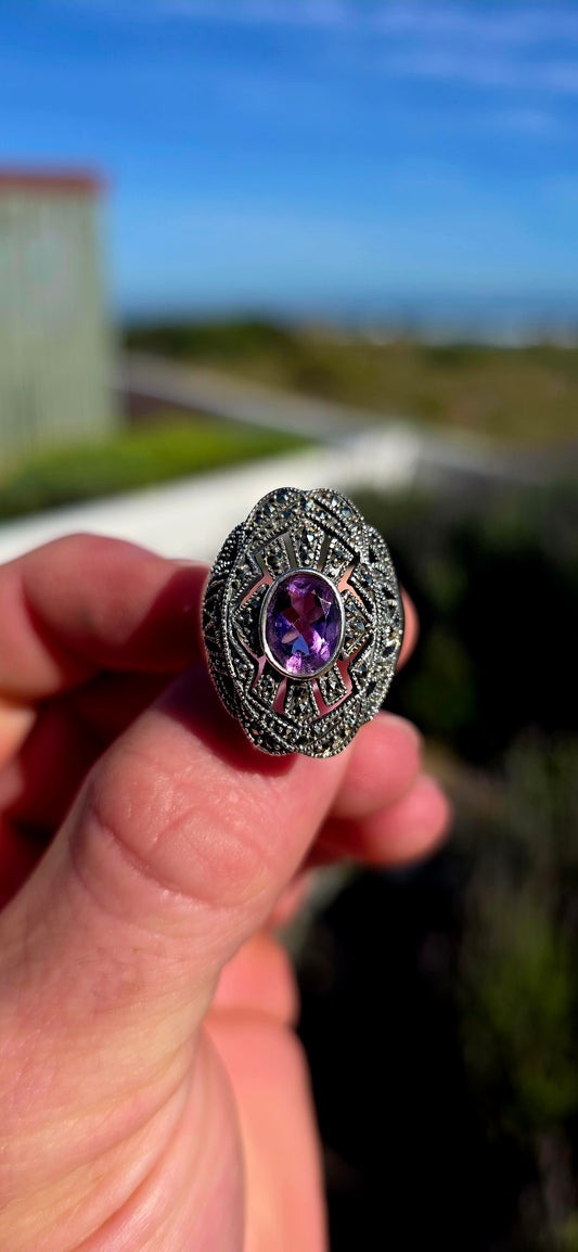 Bold, architectural and fabulously glamorous! This chunky Art Deco Revival dress ring is crafted in solid sterling silver and features an elongated statement face with intricate pierced filigree-style openwork.
