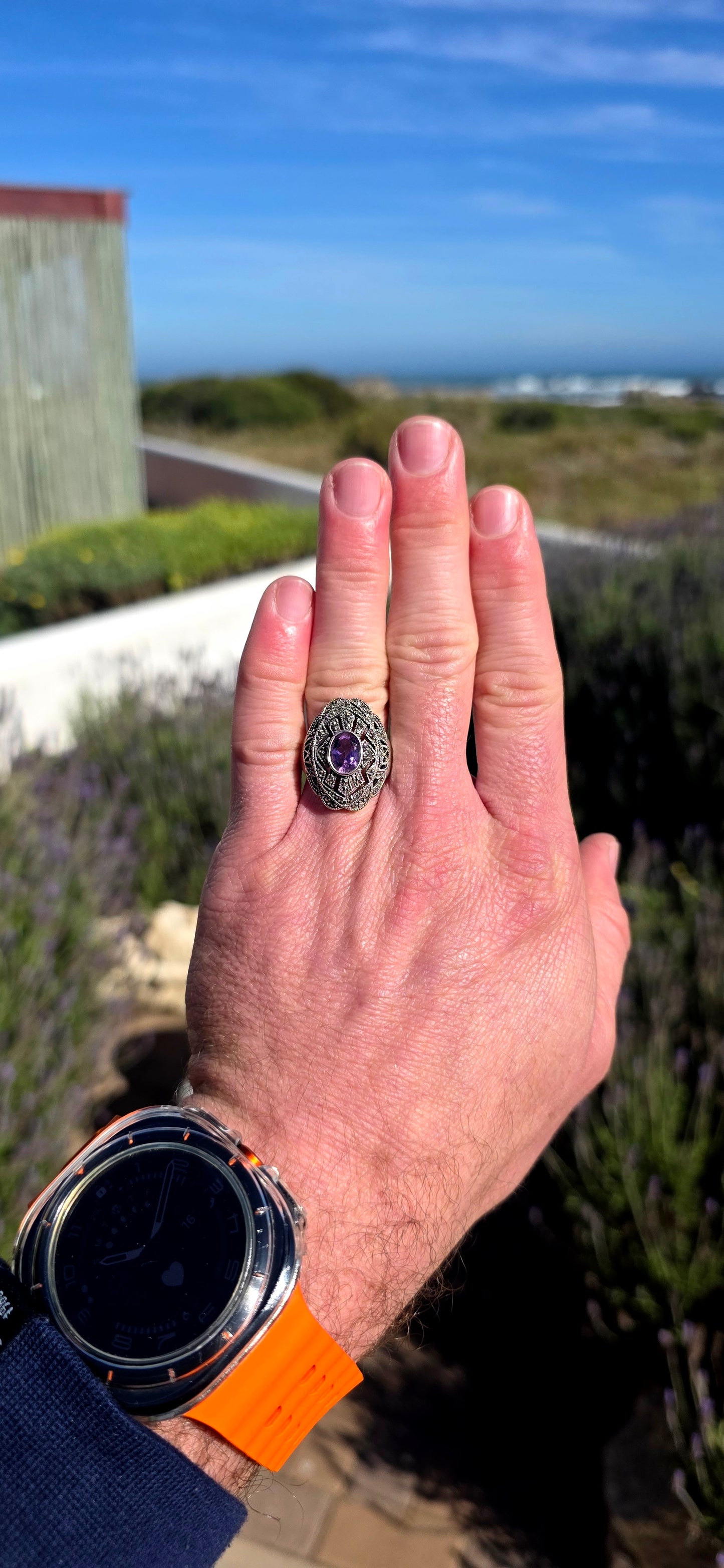 Bold, architectural and fabulously glamorous! This chunky Art Deco Revival dress ring is crafted in solid sterling silver and features an elongated statement face with intricate pierced filigree-style openwork.