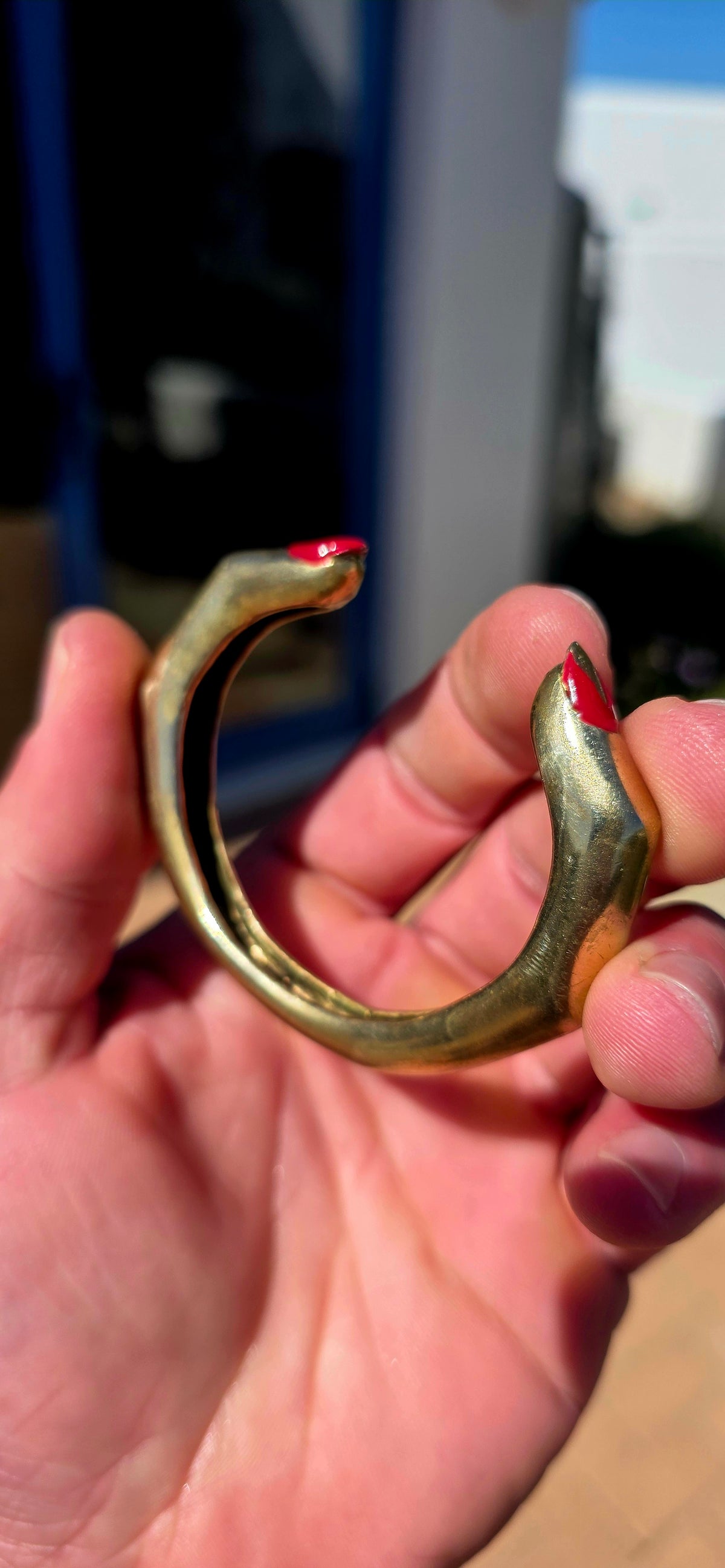 From cult Italian jewellery designer Delfina Delettrez, this fabulous and VERY sought-after “Finger Mood” cuff bracelet is sculpted in bronze as two beautifully surreal fingers wrapping around the wrist — complete with those wonderfully cheeky red enamel.