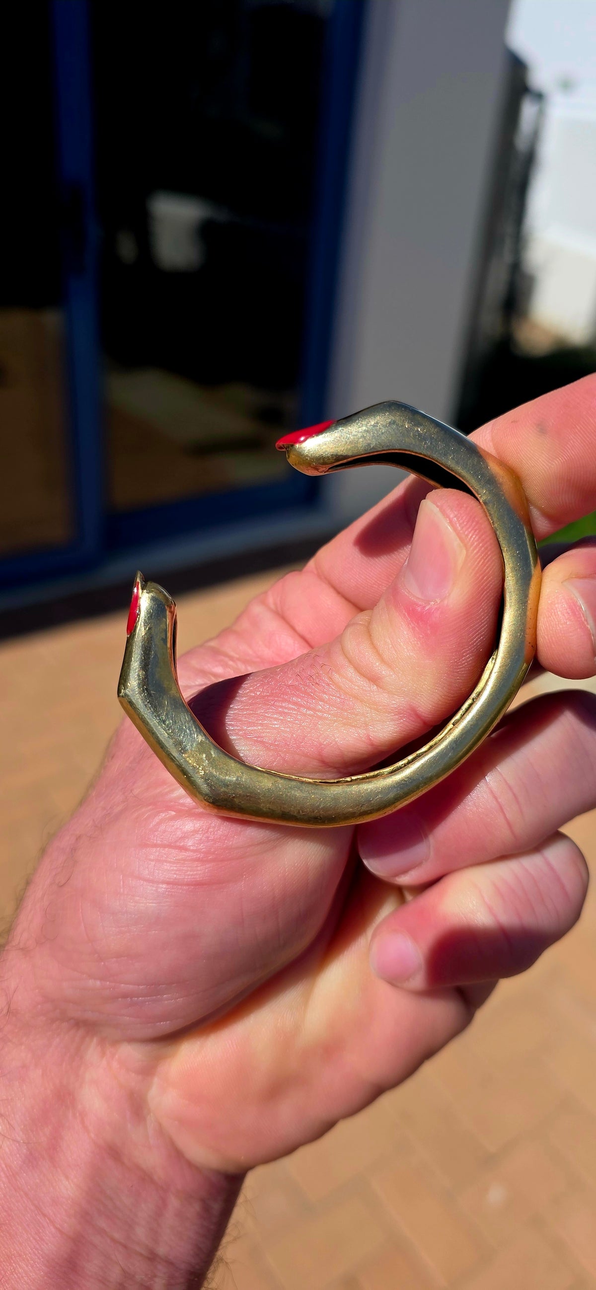 From cult Italian jewellery designer Delfina Delettrez, this fabulous and VERY sought-after “Finger Mood” cuff bracelet is sculpted in bronze as two beautifully surreal fingers wrapping around the wrist — complete with those wonderfully cheeky red enamel.