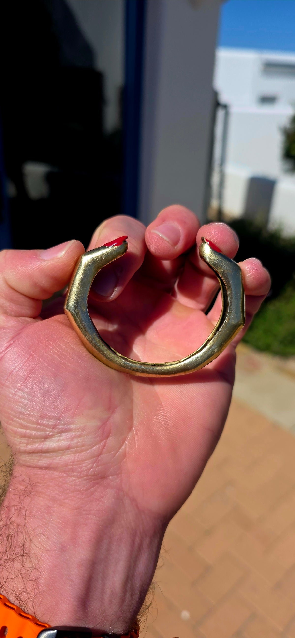 From cult Italian jewellery designer Delfina Delettrez, this fabulous and VERY sought-after “Finger Mood” cuff bracelet is sculpted in bronze as two beautifully surreal fingers wrapping around the wrist — complete with those wonderfully cheeky red enamel.
