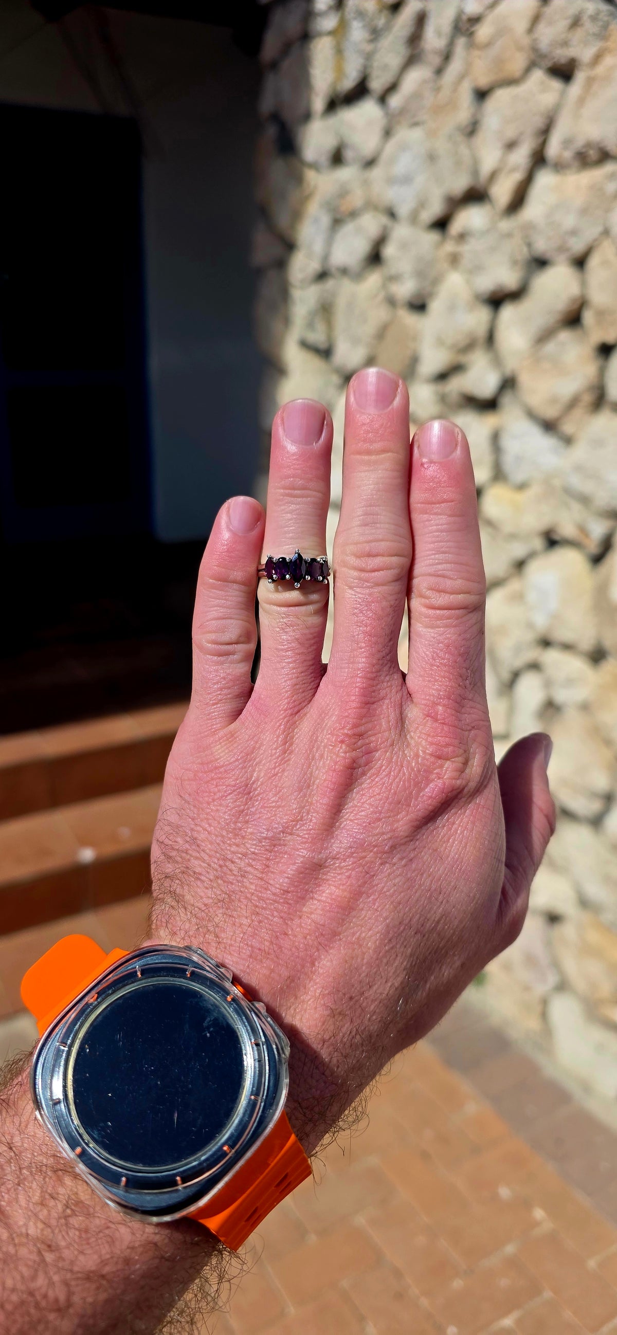 Rich, elegant and beautiful!! This sterling silver half-eternity style ring showcases a gorgeous graduated arrangement of five natural rhodolite garnets, each individually prong-set to maximise their colour and sparkle.