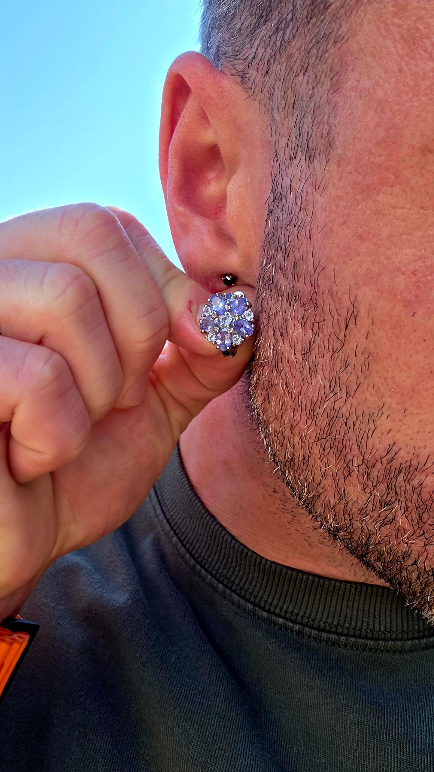 A fabulous burst of TANZANITE! These gorgeous sterling silver earrings are designed as lush floral clusters, absolutely packed with that unmistakable violet-blue sparkle.