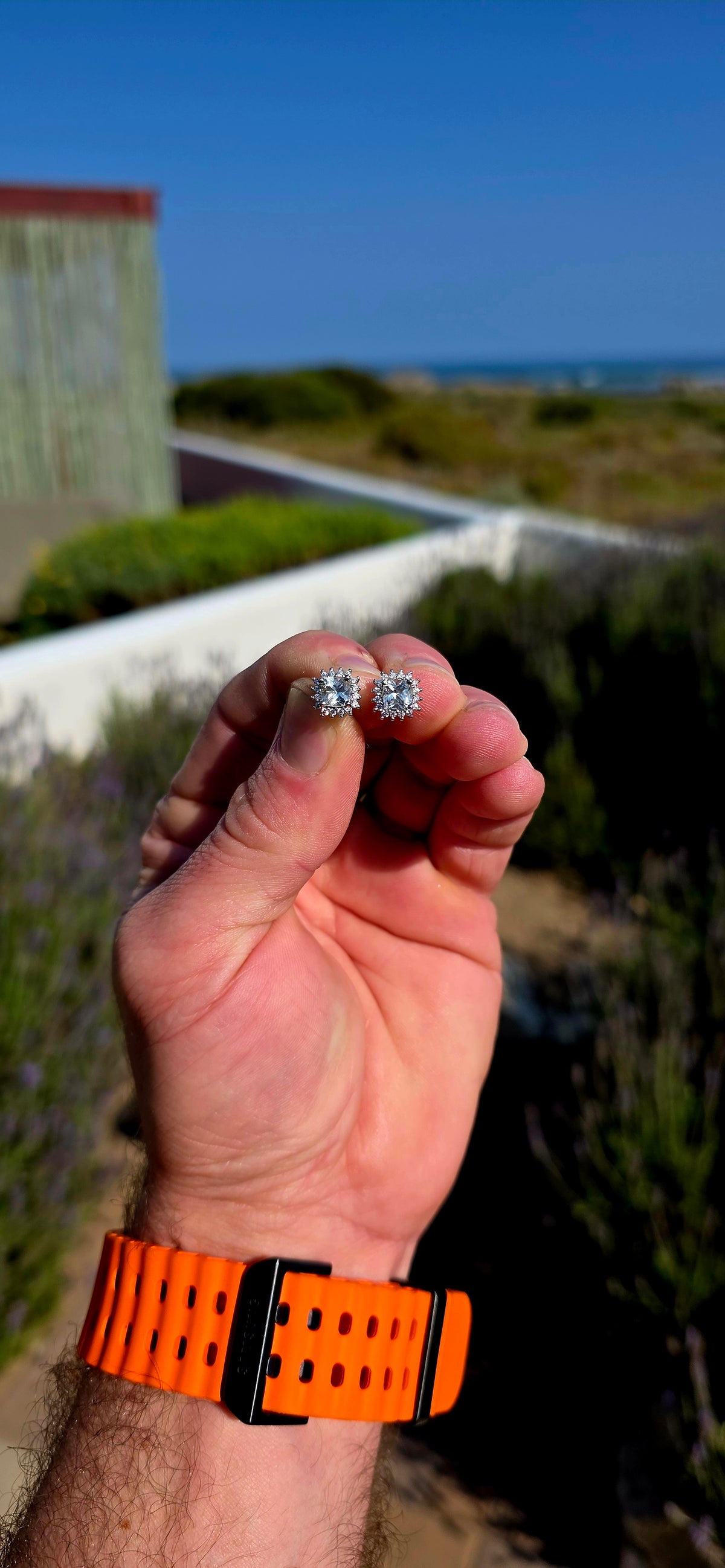 Classic sparkle with a fabulous vintage-inspired feel! These sterling silver halo stud earrings feature a beautifully faceted cushion-cut clear quartz at the centre of each earring, securely prong-set.