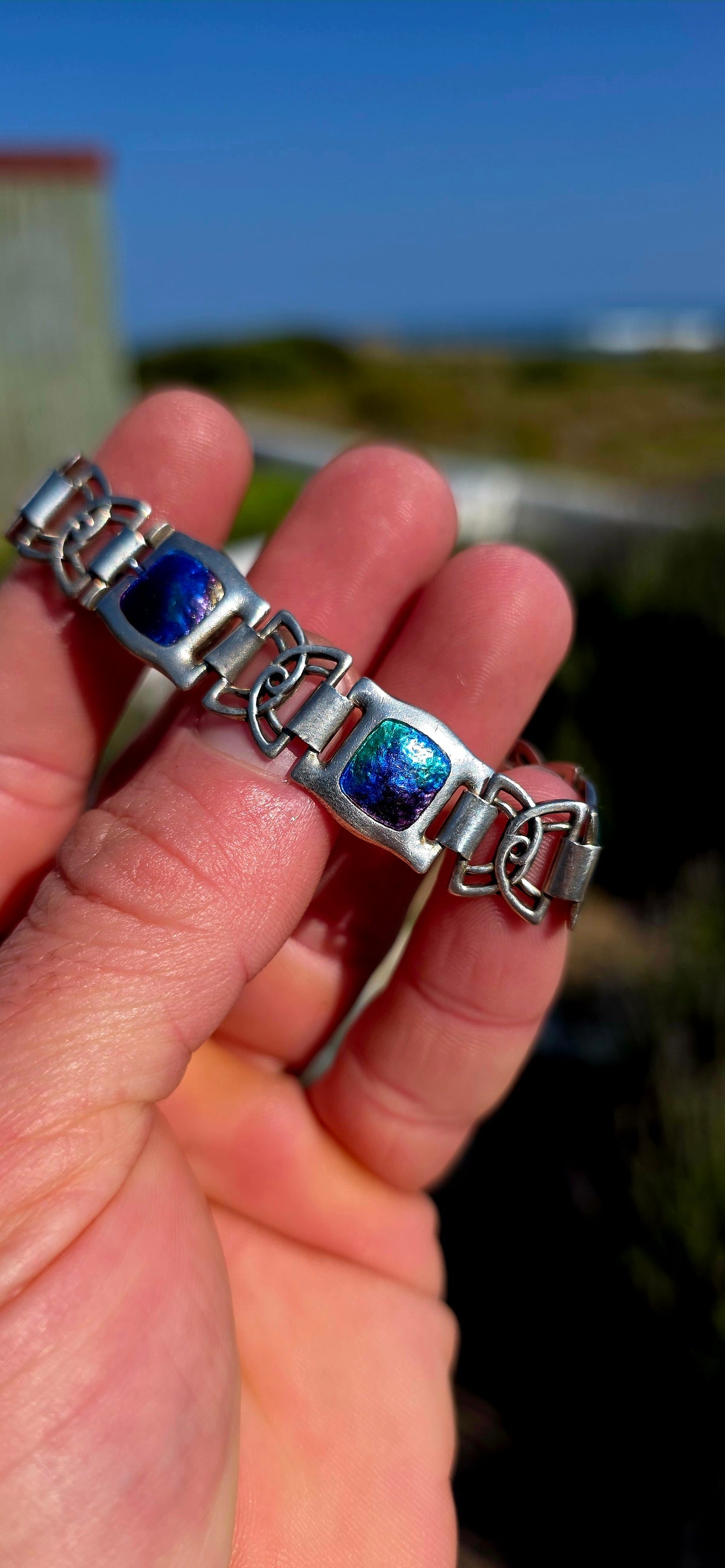 Crafted by celebrated British jeweller Charles Horner, this beautiful hallmarked sterling silver panel bracelet is a wonderful example of early 20th-century British Art Nouveau jewellery.