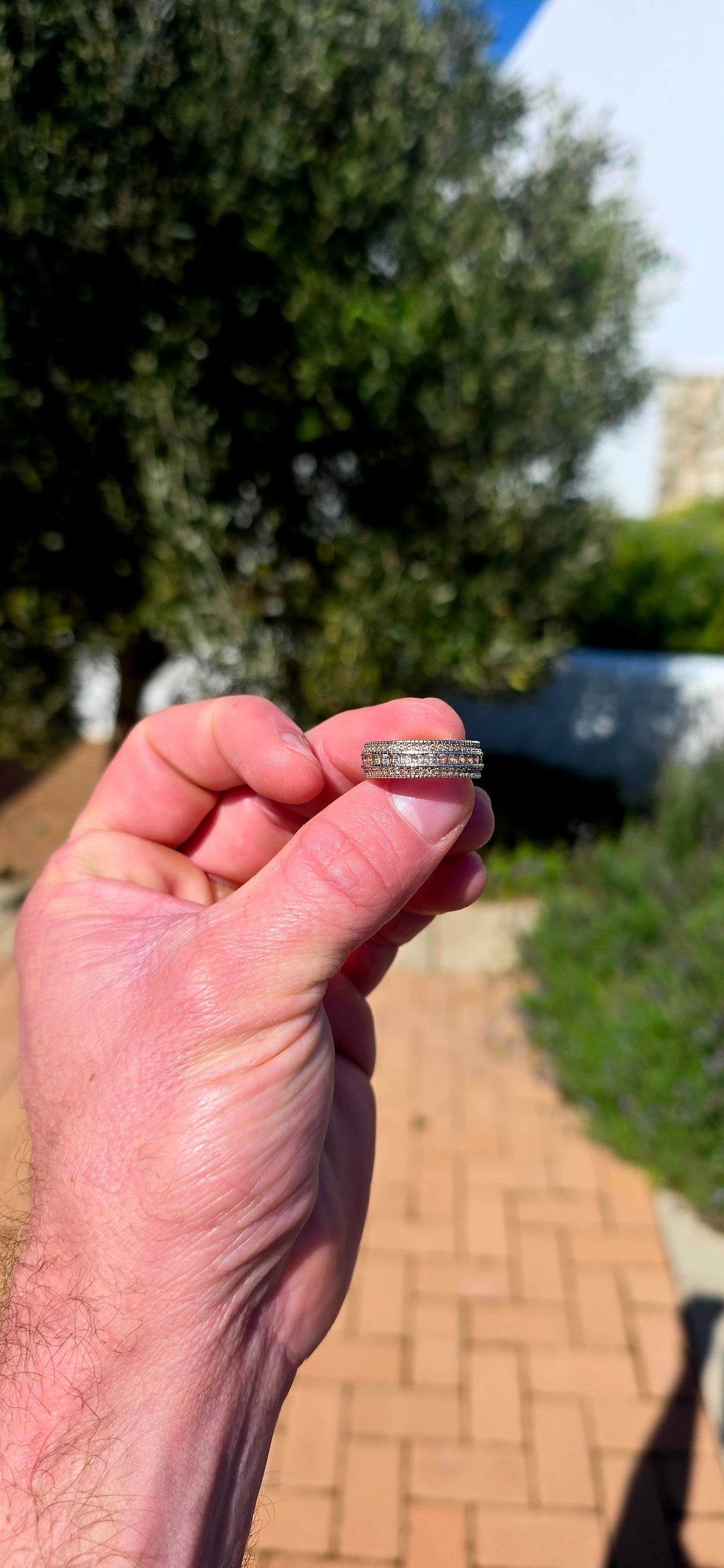 Chunky, contemporary and beautifully UNISEX — this sterling silver full-eternity band is ALL about sparkle!