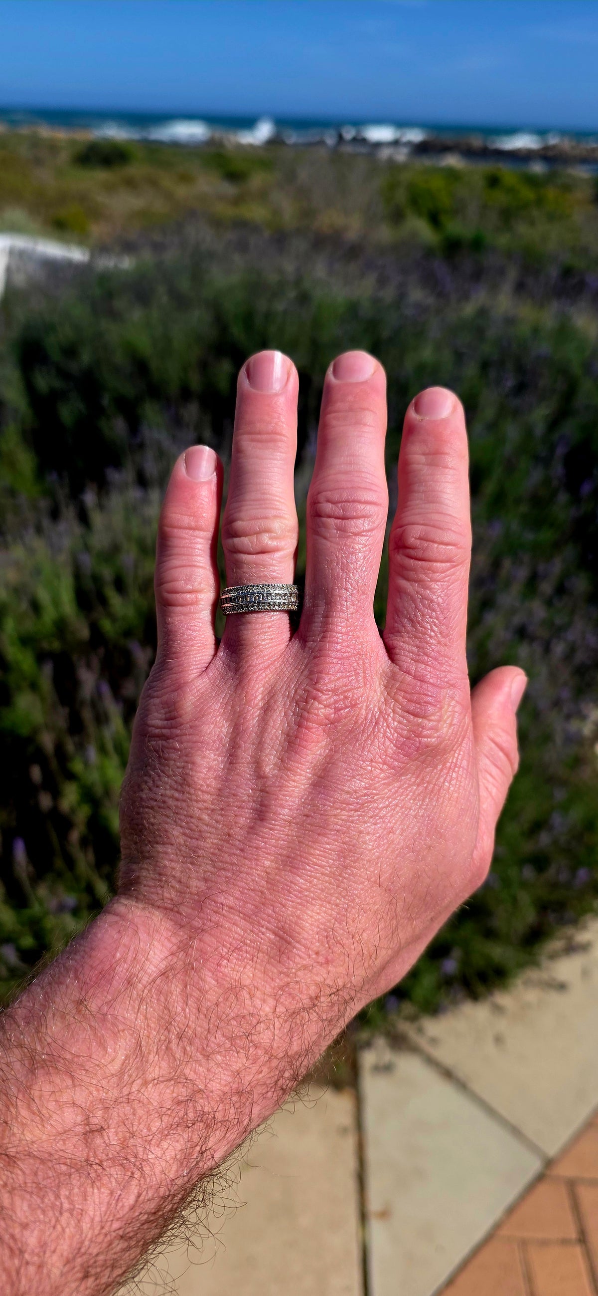 Chunky, contemporary and beautifully UNISEX — this sterling silver full-eternity band is ALL about sparkle!