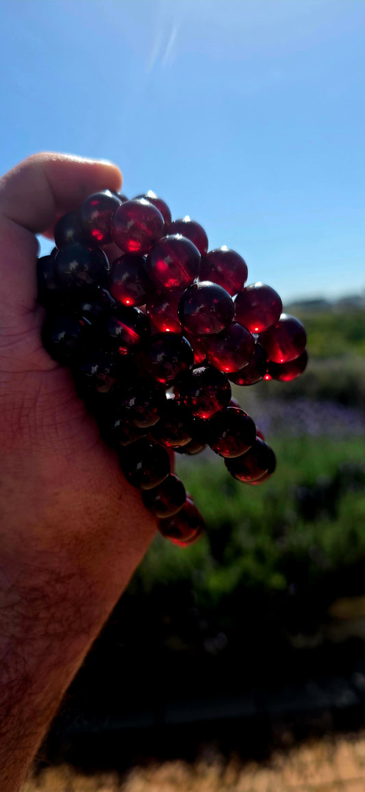 Ohhh these are something SPECIAL! Beautifully chunky stretch bracelets made from generously sized round Cherry Baltic amber beads, displaying the most incredible deep wine-red, burgundy and black-cherry tones.