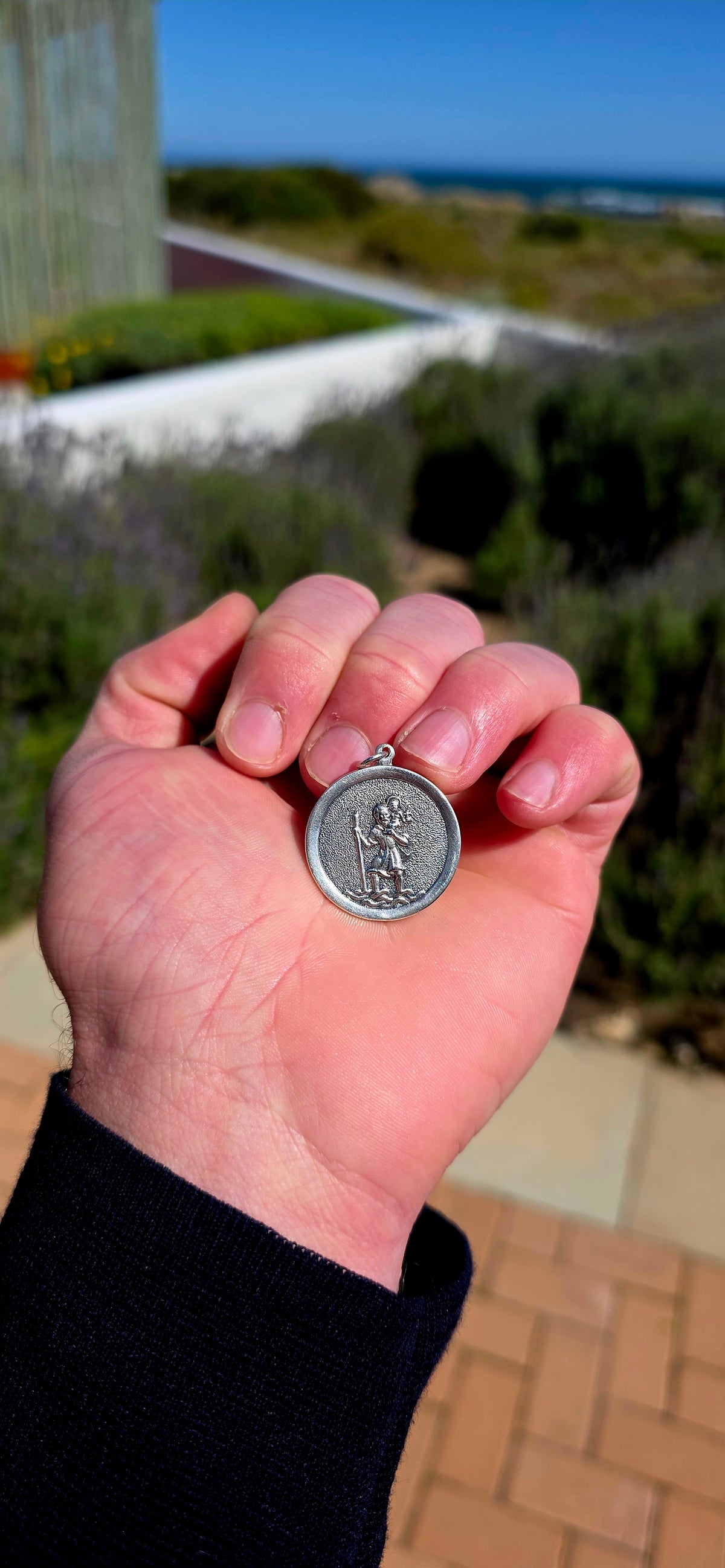 A wonderfully generous-sized vintage St Christopher pendant, crafted in solid sterling silver and beautifully rich in traditional symbolism.