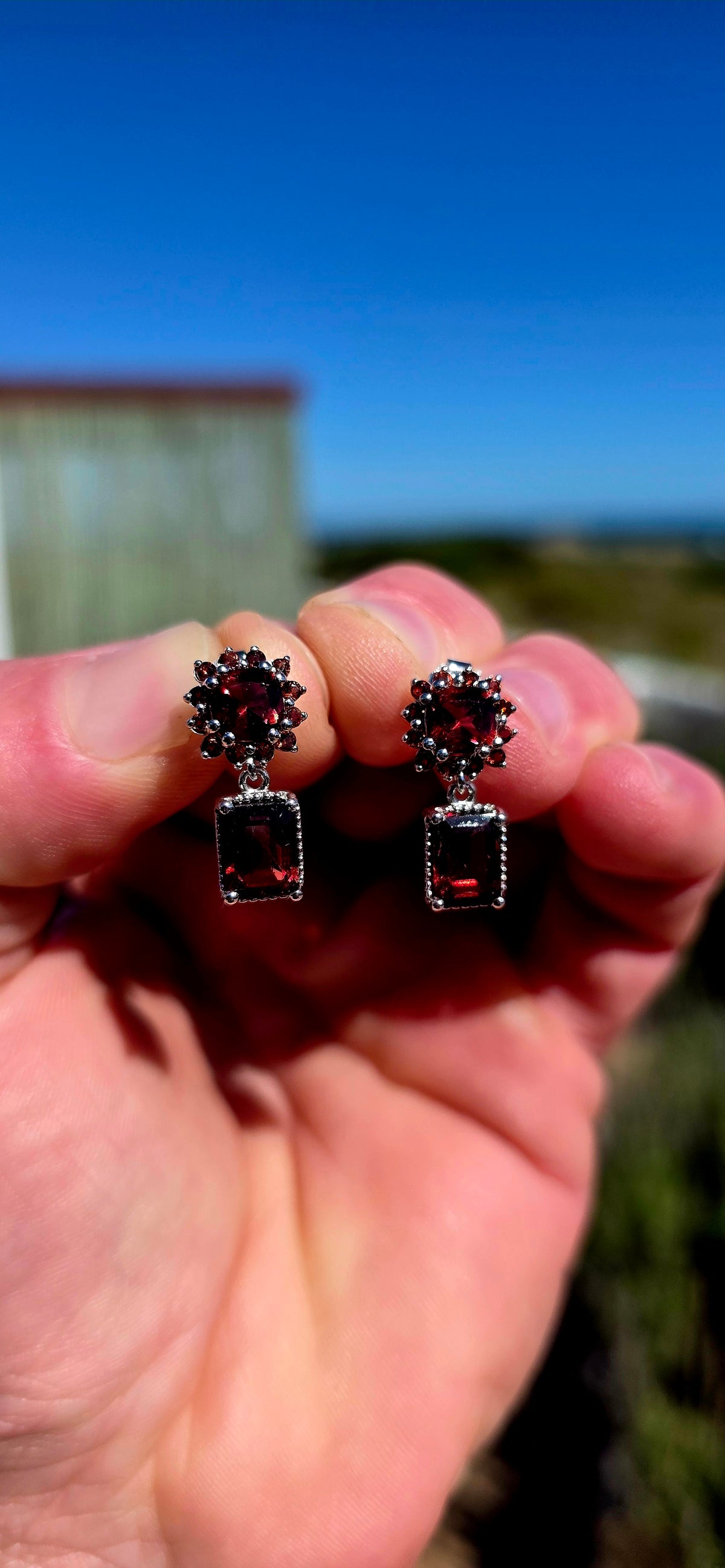 Oh these are GORGEOUS! Rich, dramatic and beautifully feminine — a fabulous pair of solid sterling silver drop earrings absolutely dripping in deep wine-red garnets.