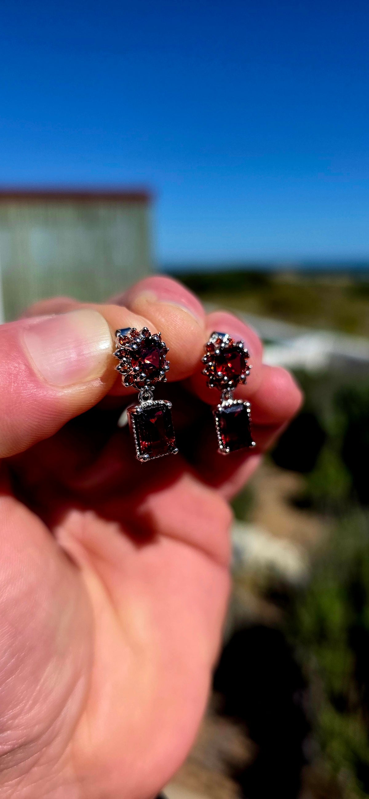 Oh these are GORGEOUS! Rich, dramatic and beautifully feminine — a fabulous pair of solid sterling silver drop earrings absolutely dripping in deep wine-red garnets.