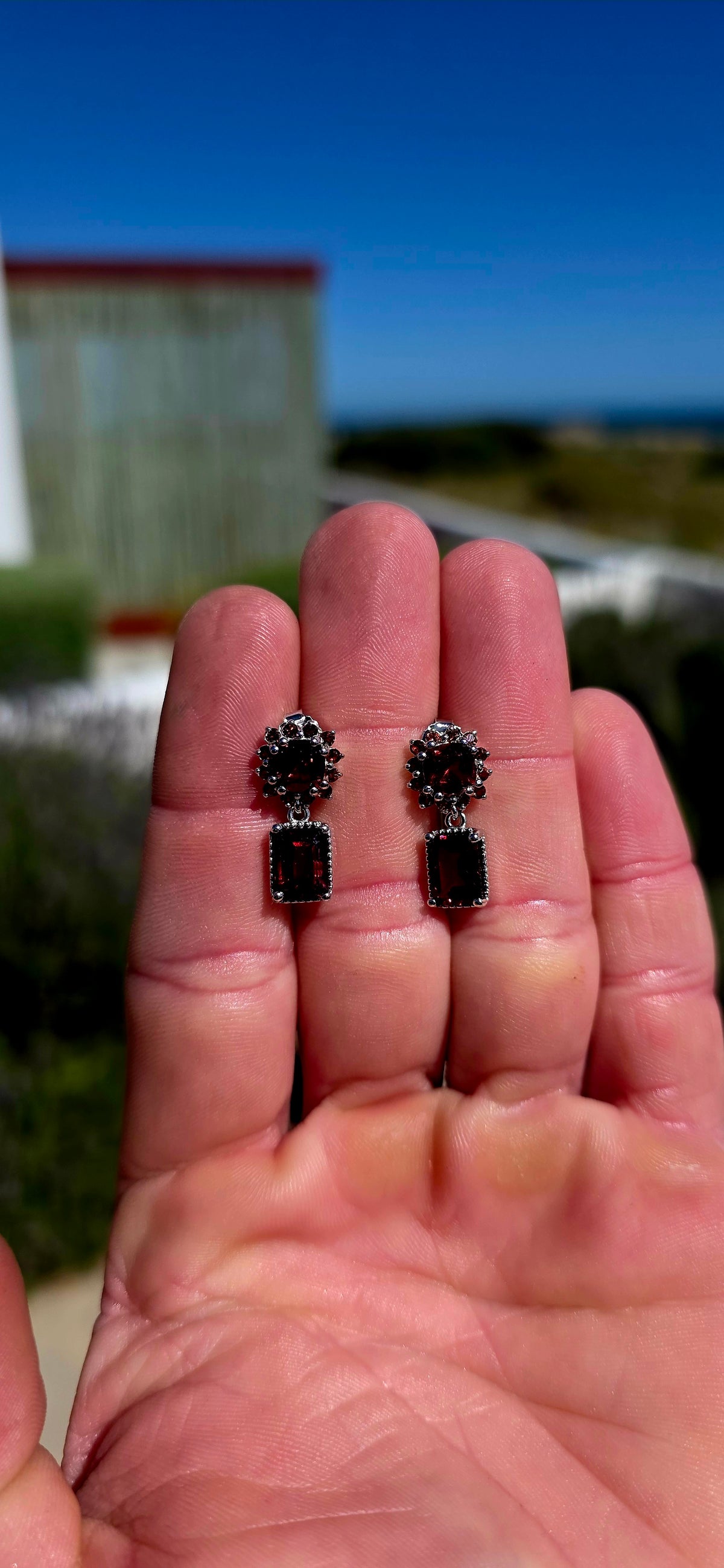 Oh these are GORGEOUS! Rich, dramatic and beautifully feminine — a fabulous pair of solid sterling silver drop earrings absolutely dripping in deep wine-red garnets.