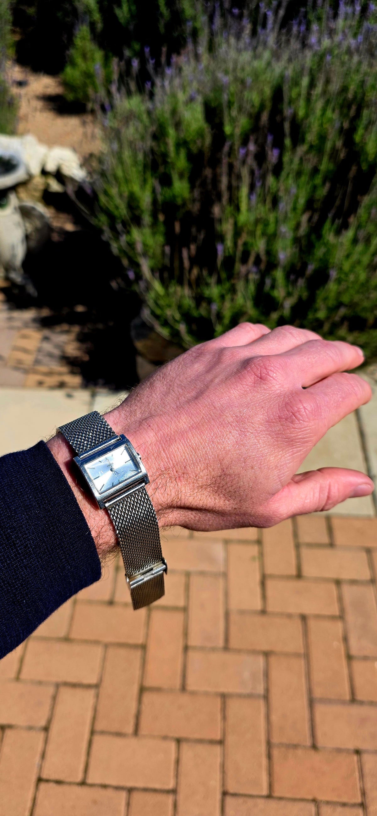 Oh this is wonderfully RETRO! A vintage ladies GUESS Mod-Mesh quartz wristwatch, combining a sleek rectangular case with a fabulous wide silver-tone woven mesh bracelet — giving it that unmistakable minimalist designer look.