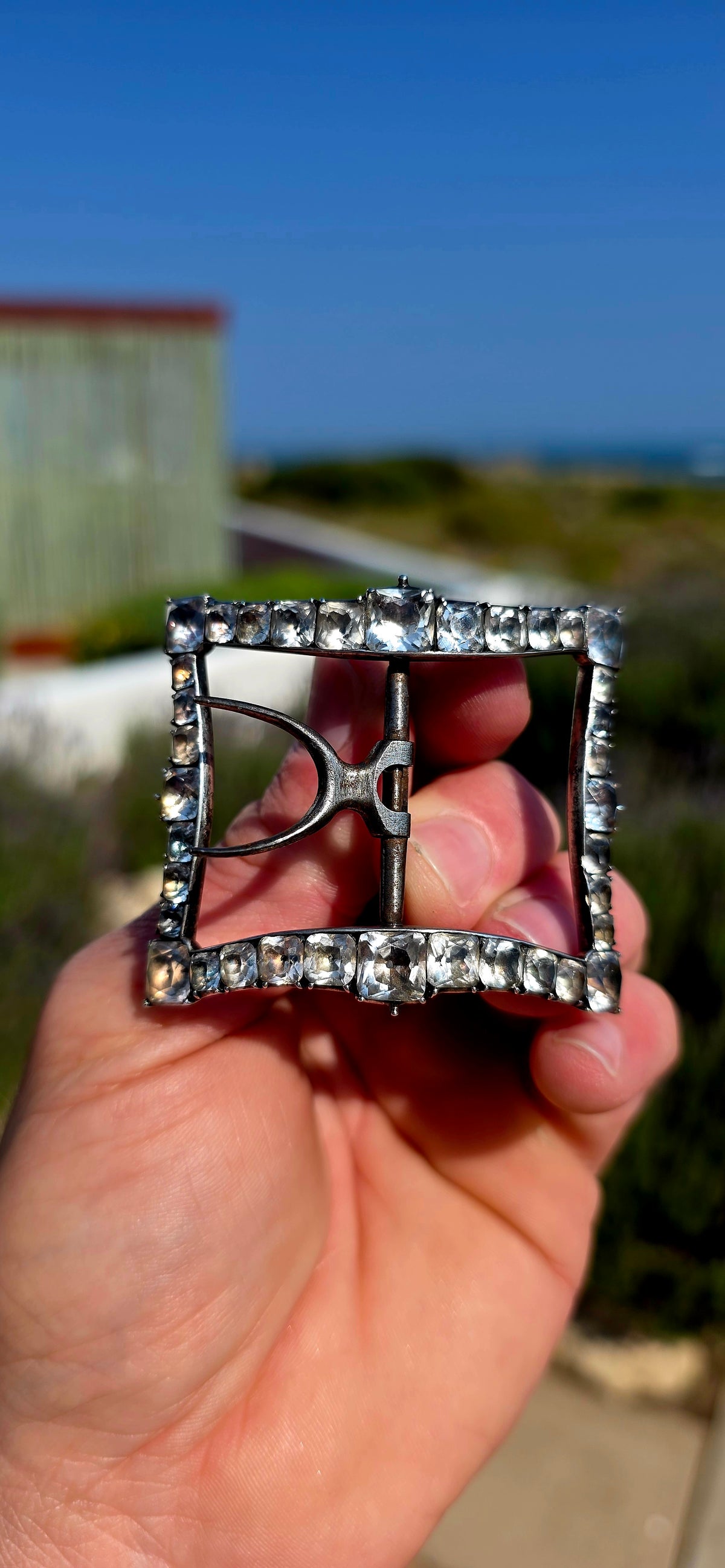Now THIS is proper Georgian history! Dating to around the 1790s, this fabulous antique shoe buckle is crafted in sterling silver and completely framed by sparkling foiled-back cushion-cut Black Dot paste stones.