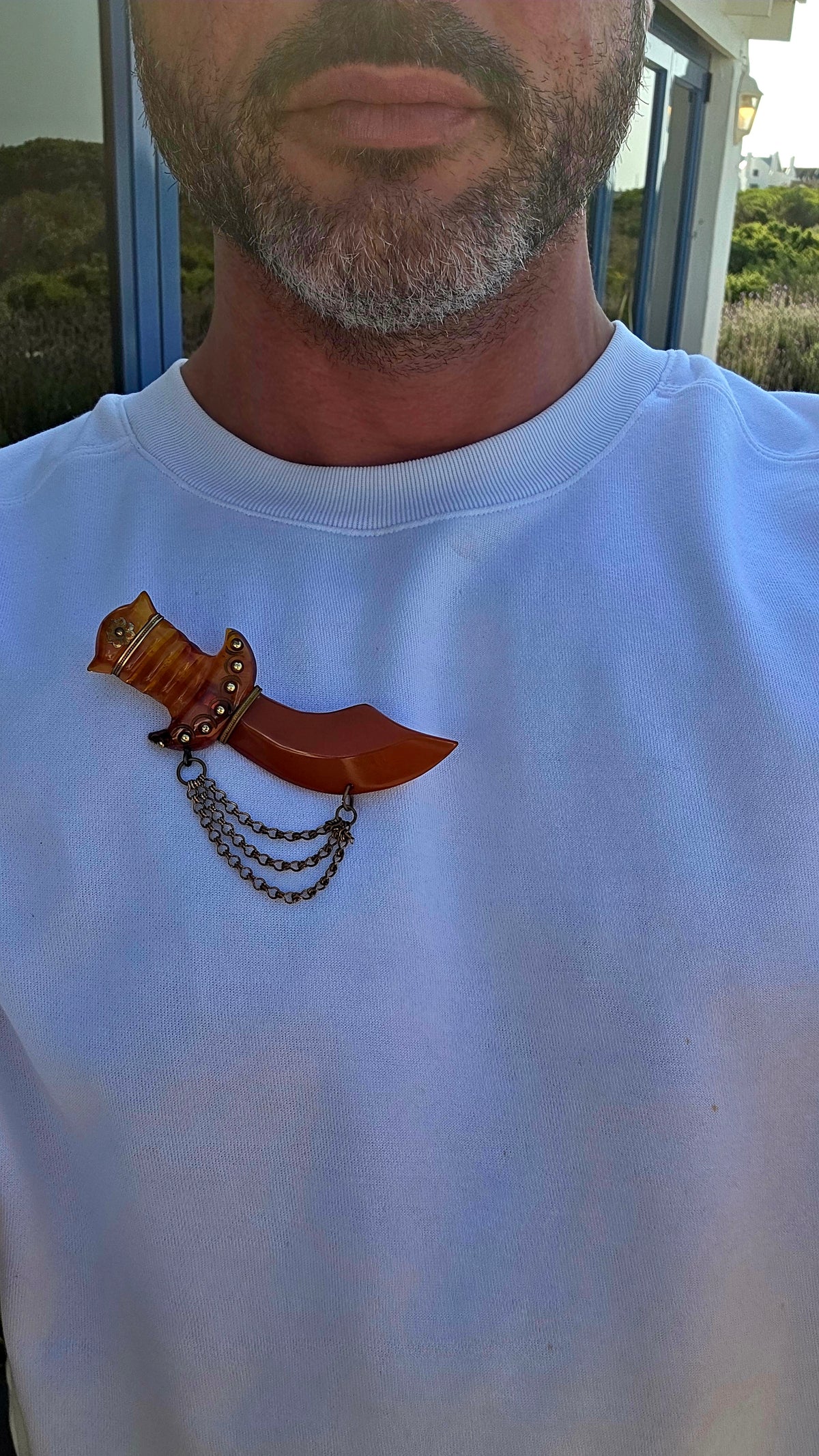 This is one for the serious Bakelite collectors! An absolutely fabulous and OVERSIZED Art Deco-era novelty brooch, dating to circa the 1930s and fashioned as an exotic Persian-style curved dagger.