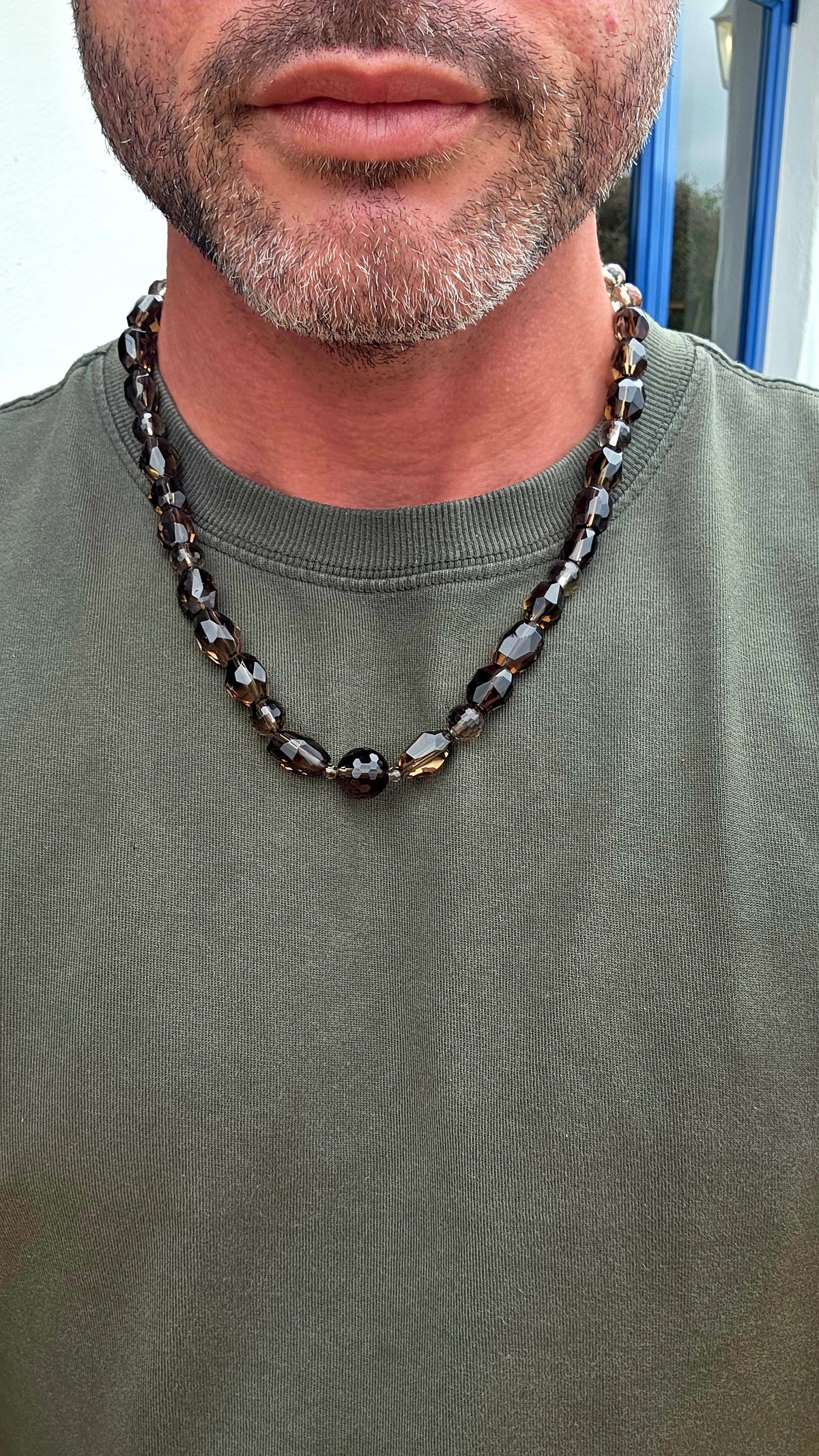 Beautifully and earthy! This necklace is composed entirely of natural smoky quartz gemstone beads, individually faceted to catch and reflect the light.