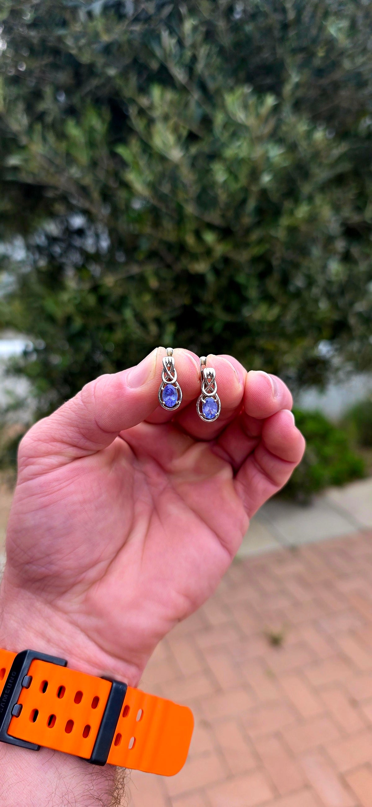 Something a little SPECIAL! These beautiful sterling silver earrings combine the mesmerising violet-blue of tanzanite with the symbolism of the Celtic love knot.