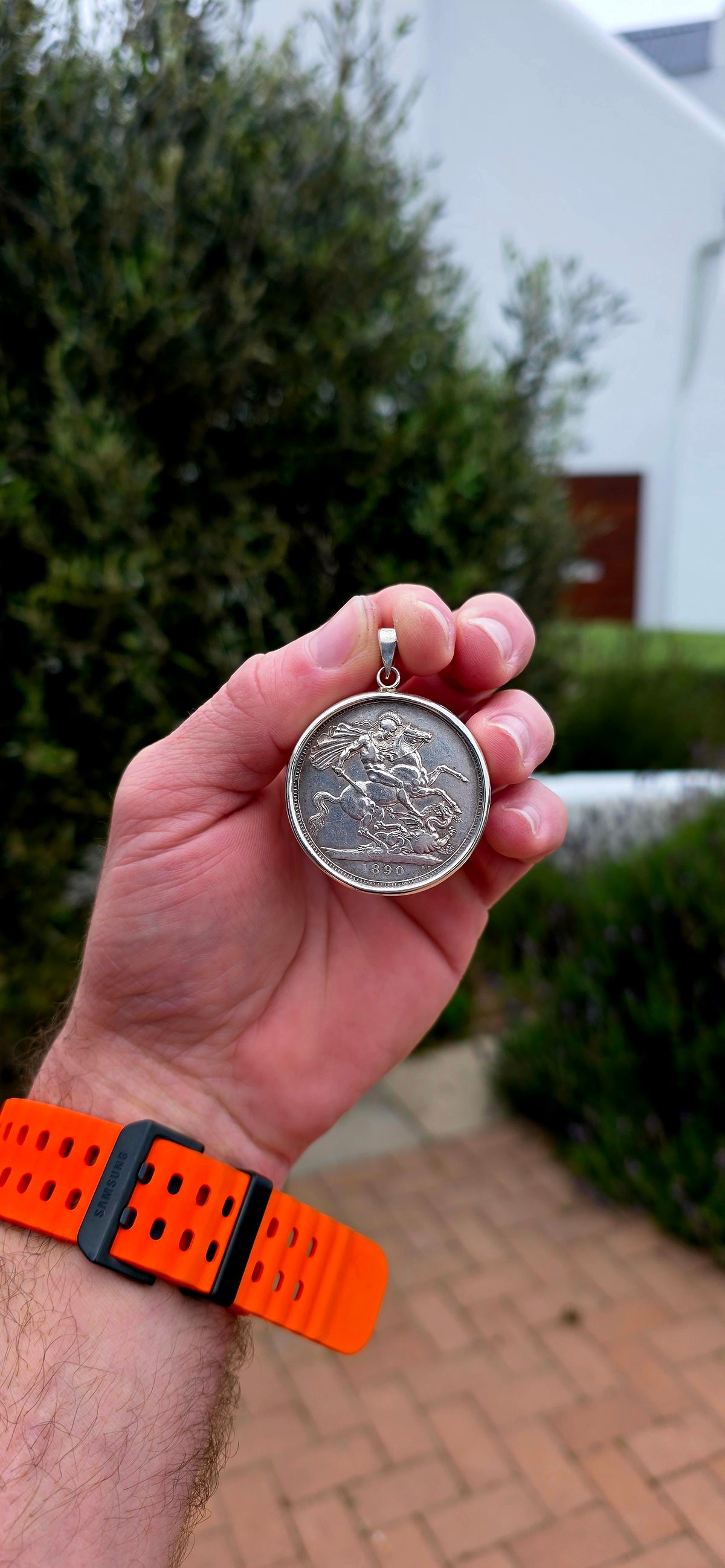 A magnificent and highly collectible Victorian Crown coin dating to 1890, struck during the reign of Queen Victoria and beautifully converted into a large statement pendant.