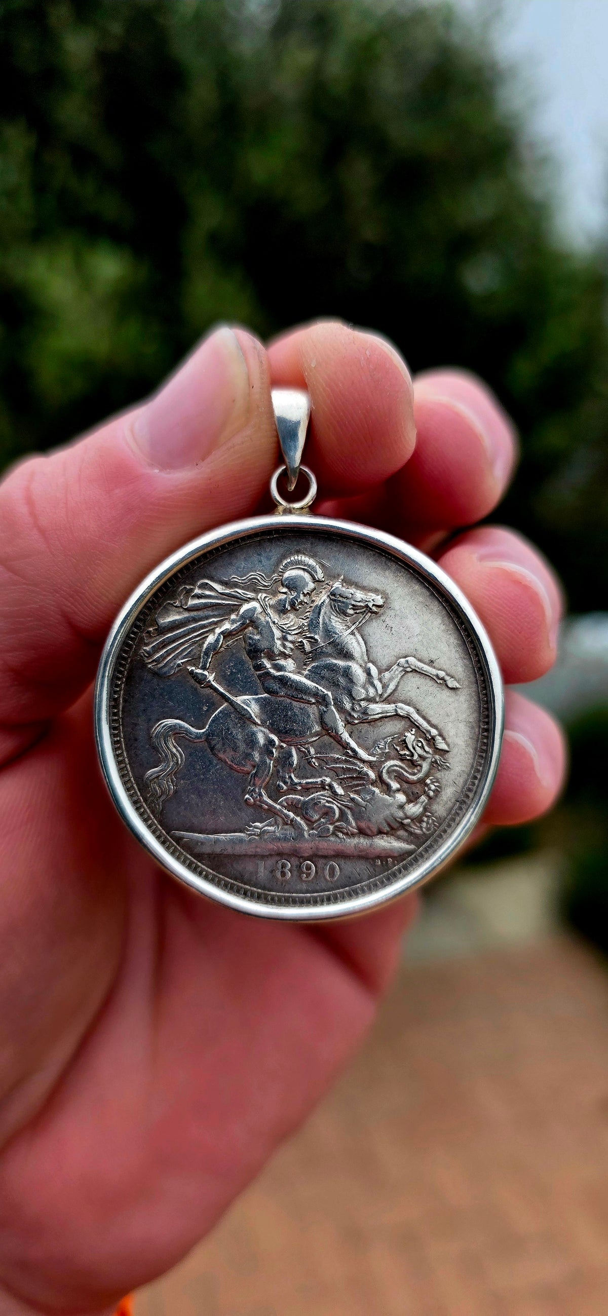 A magnificent and highly collectible Victorian Crown coin dating to 1890, struck during the reign of Queen Victoria and beautifully converted into a large statement pendant.