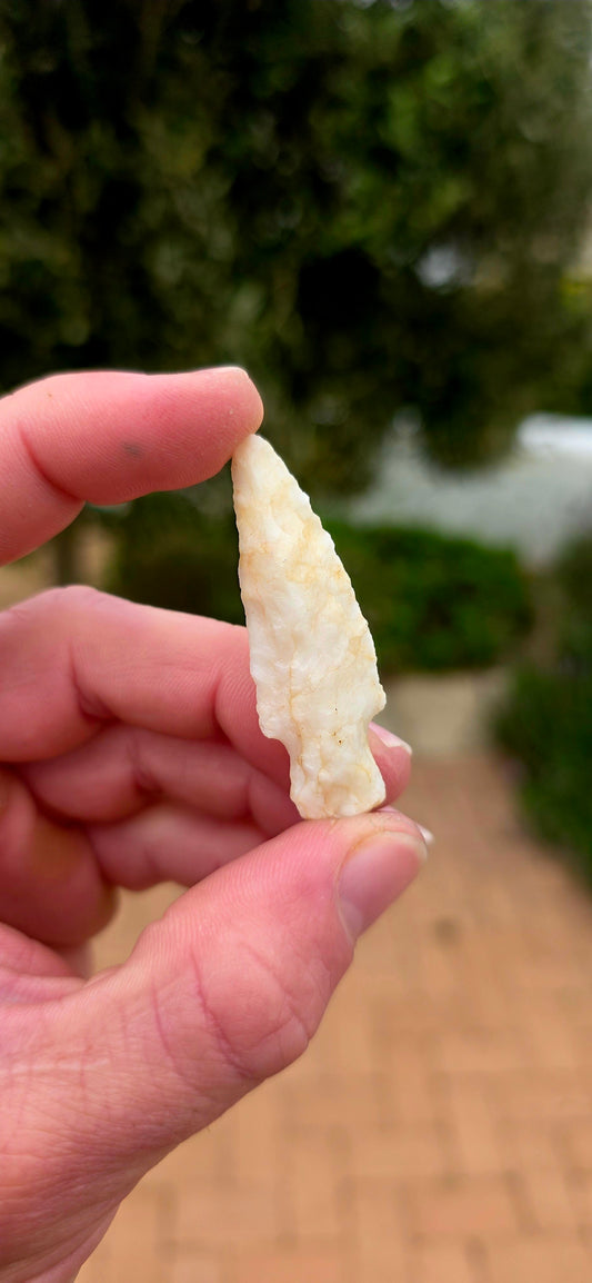 An incredible hand-knapped quartz arrowhead / projectile point, acquired as a Native American archaeological find from the western Appalachian region of North Carolina, USA.