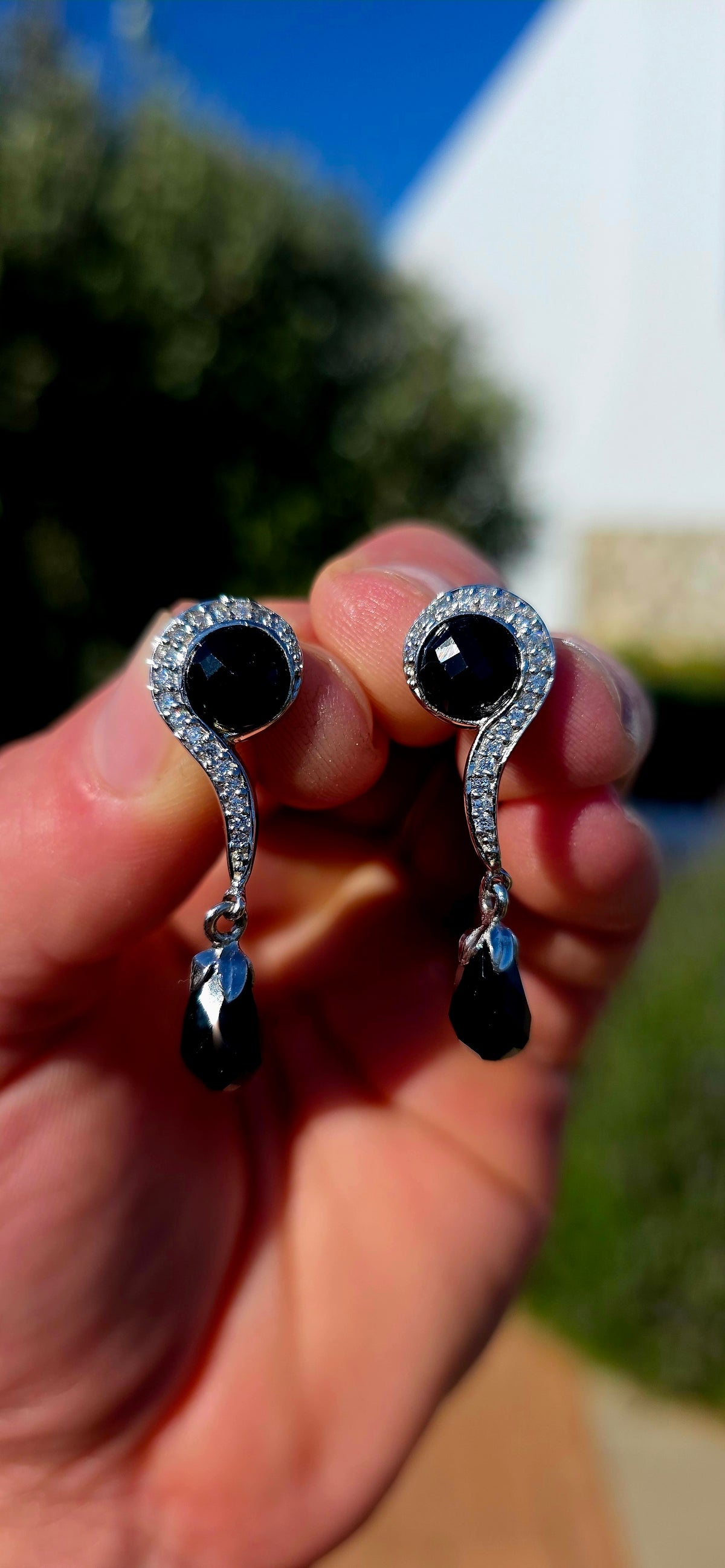 A fabulous pair of Art Deco Revival Sterling Silver drop/dangle earrings, combining glossy jet-black Onyx with sparkling clear CZ gemstones in a wonderfully glamorous 1920s/30s-inspired design.