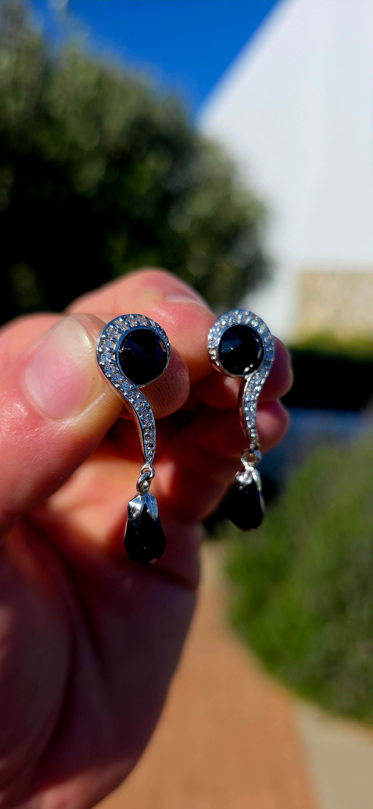 A fabulous pair of Art Deco Revival Sterling Silver drop/dangle earrings, combining glossy jet-black Onyx with sparkling clear CZ gemstones in a wonderfully glamorous 1920s/30s-inspired design.