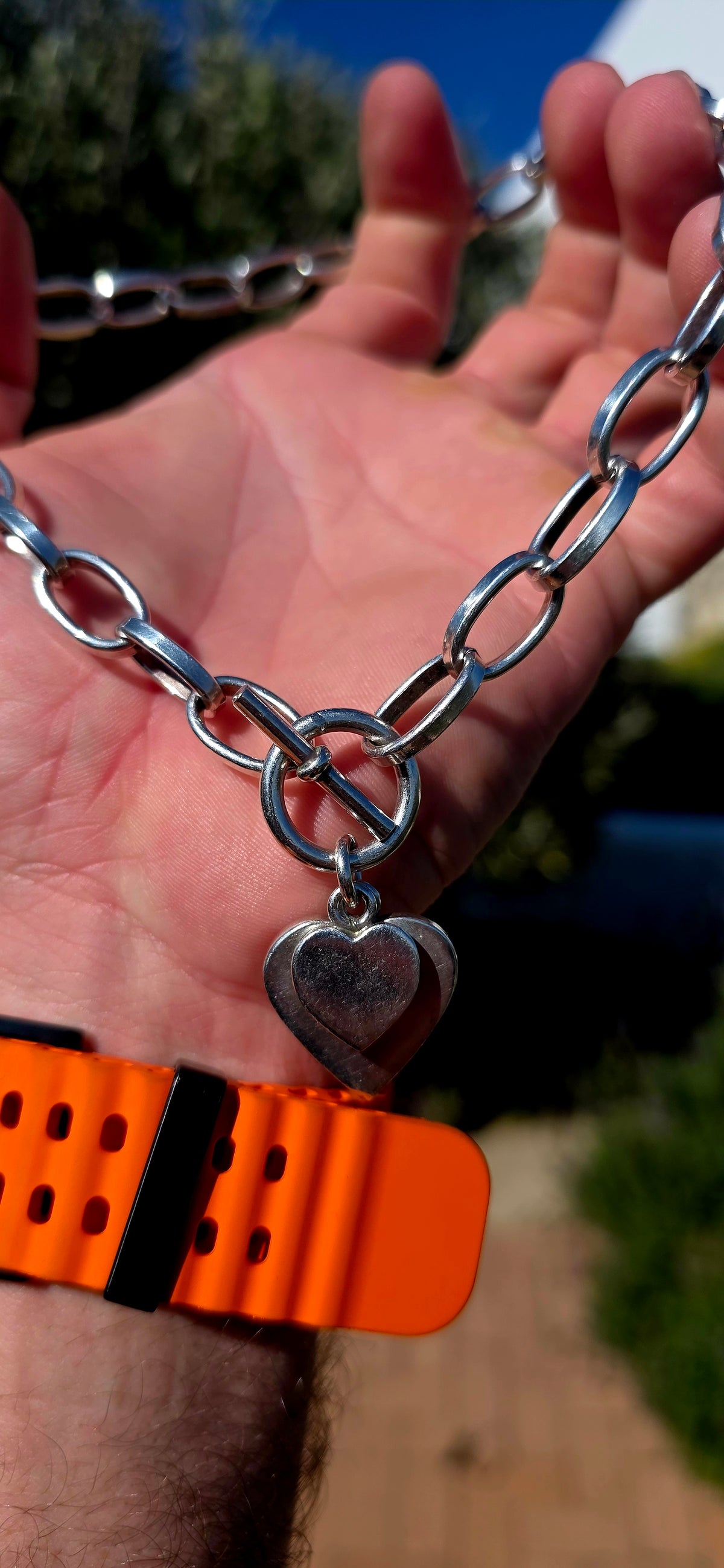 A gorgeous handmade solid Sterling Silver necklace, constructed from substantial alternating elongated oval links with beautifully flattened, almost faceted edges .