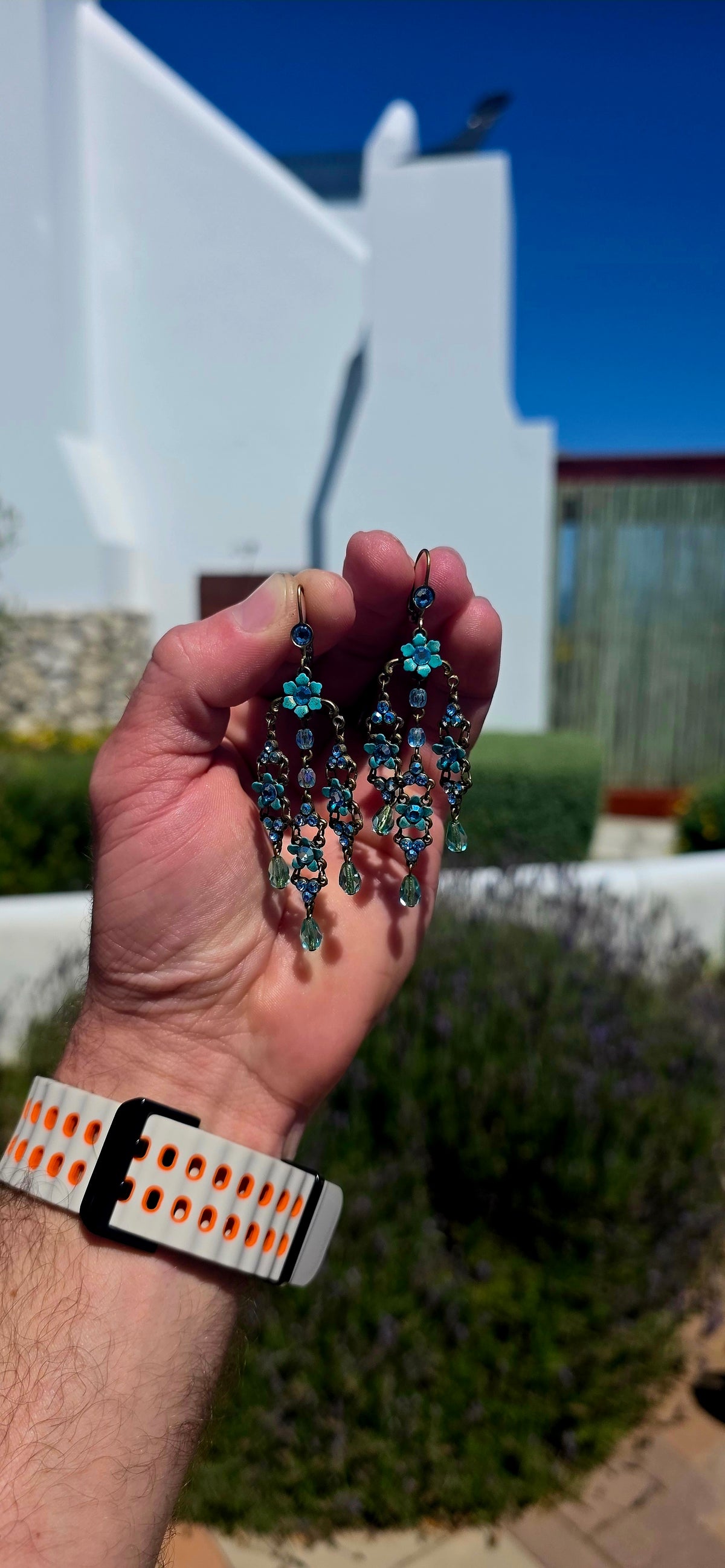 A spectacular pair of vintage designer chandelier earrings by celebrated Israeli jewellery designer Michal Negrin, known for her wonderfully romantic, colourful and unmistakably whimsical creations.