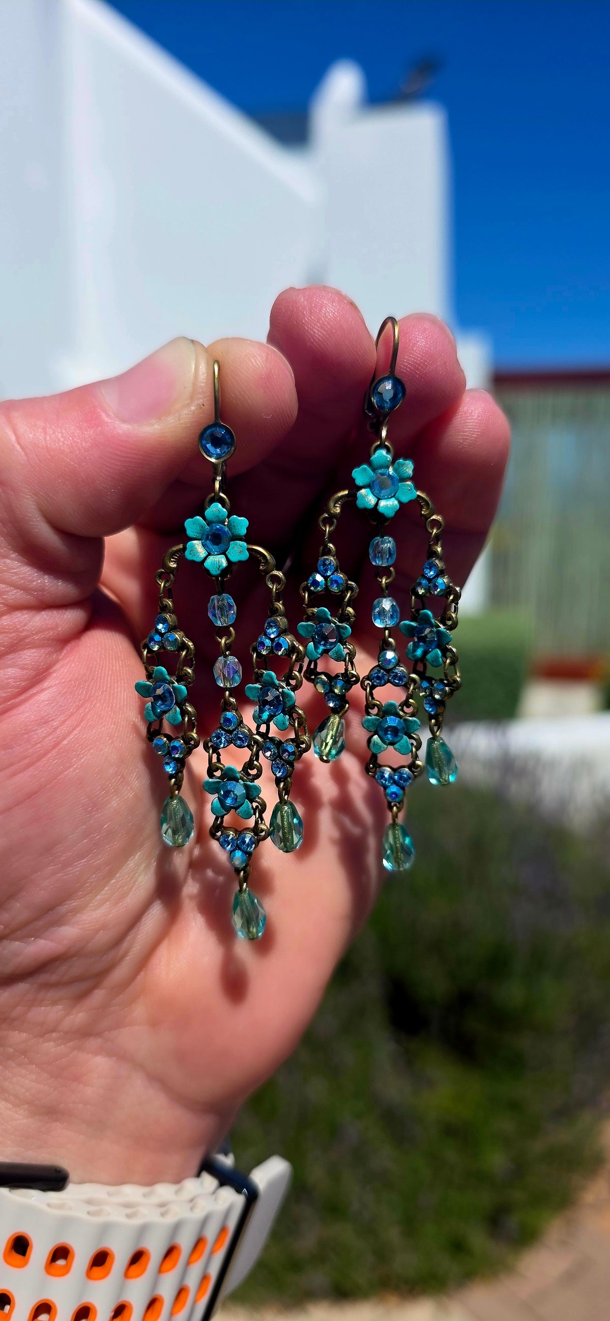A spectacular pair of vintage designer chandelier earrings by celebrated Israeli jewellery designer Michal Negrin, known for her wonderfully romantic, colourful and unmistakably whimsical creations.