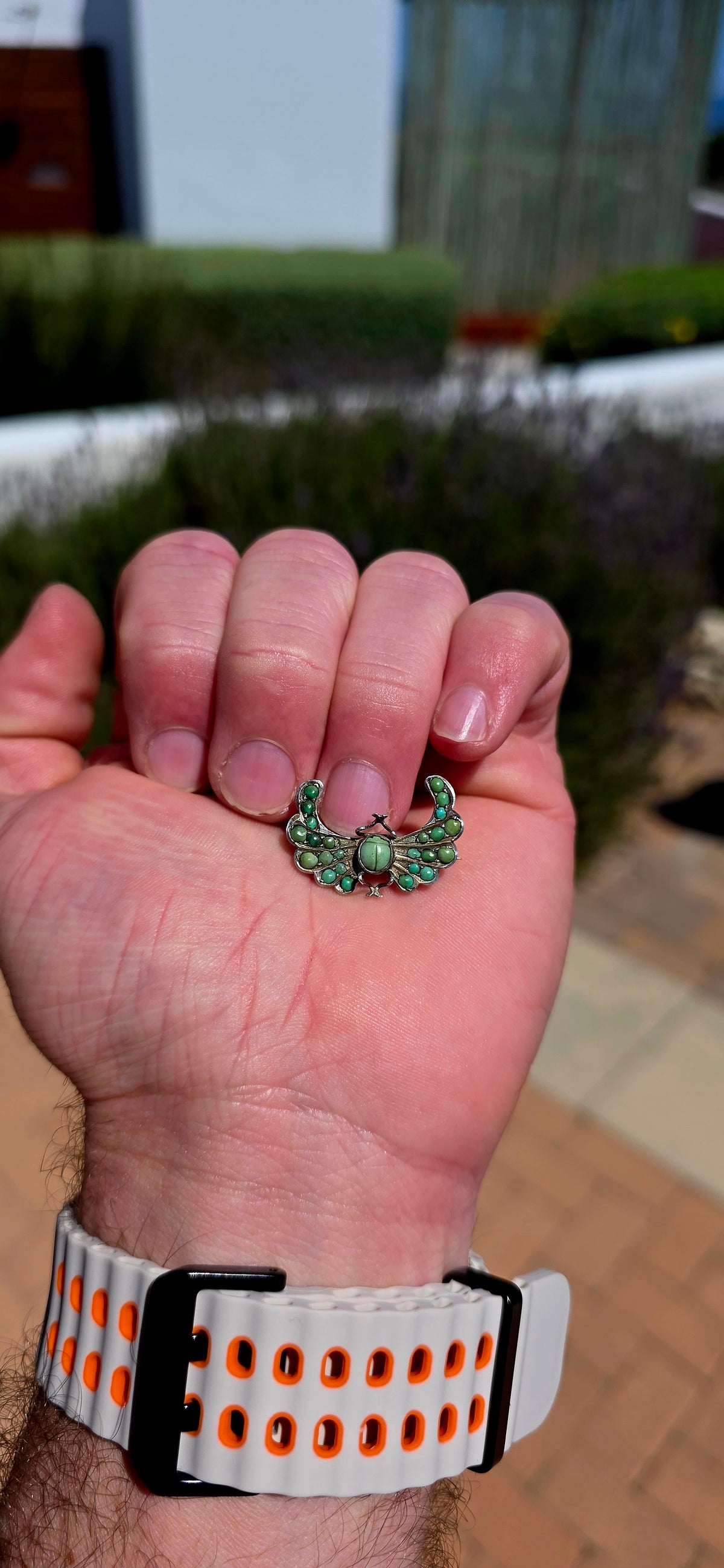 An antique late Victorian Egyptian Revival brooch, crafted in sterling silver and designed as a magnificent winged scarab.