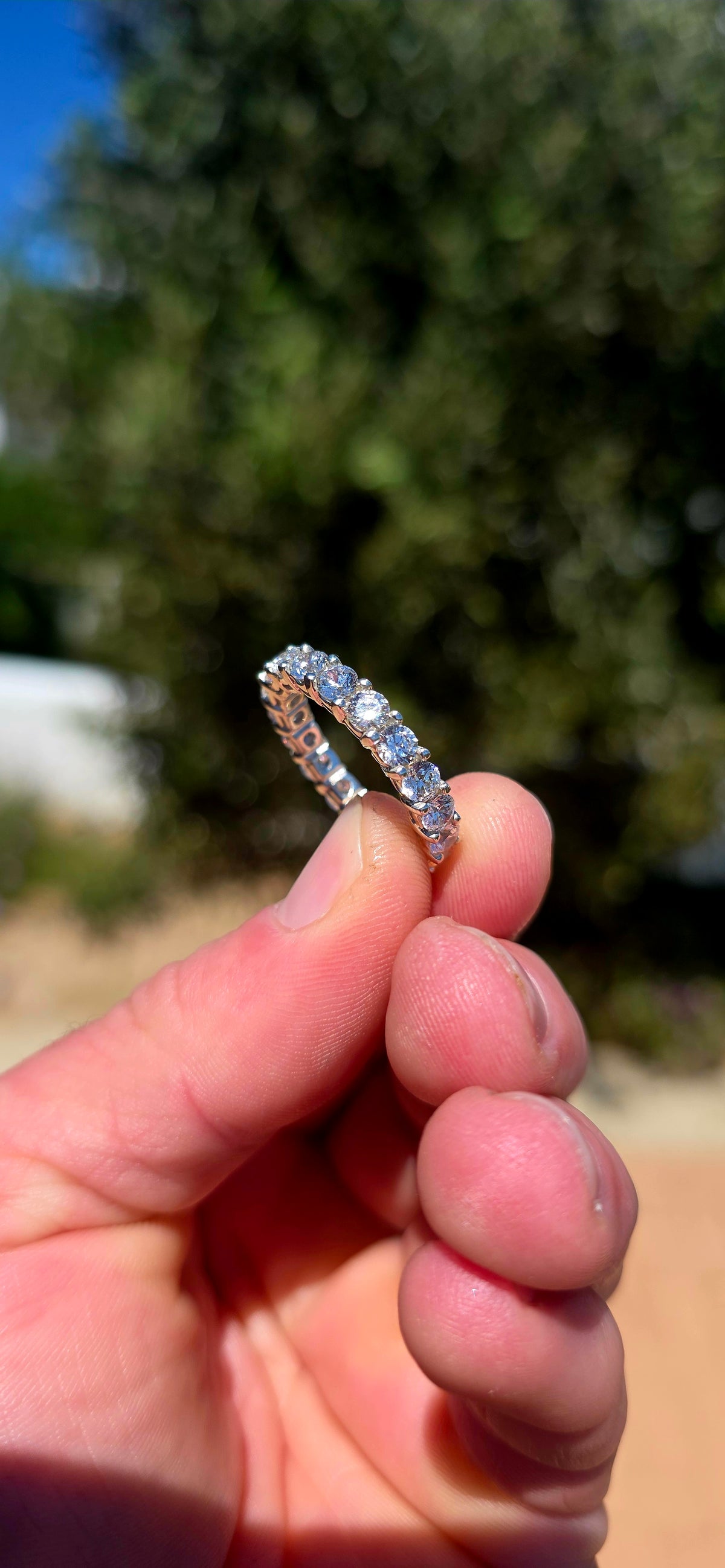 A fabulous sterling silver full eternity stacking ring, completely encircled by 19 ultra-sparkly round-cut AAA Swiss-grade CZ gemstones.