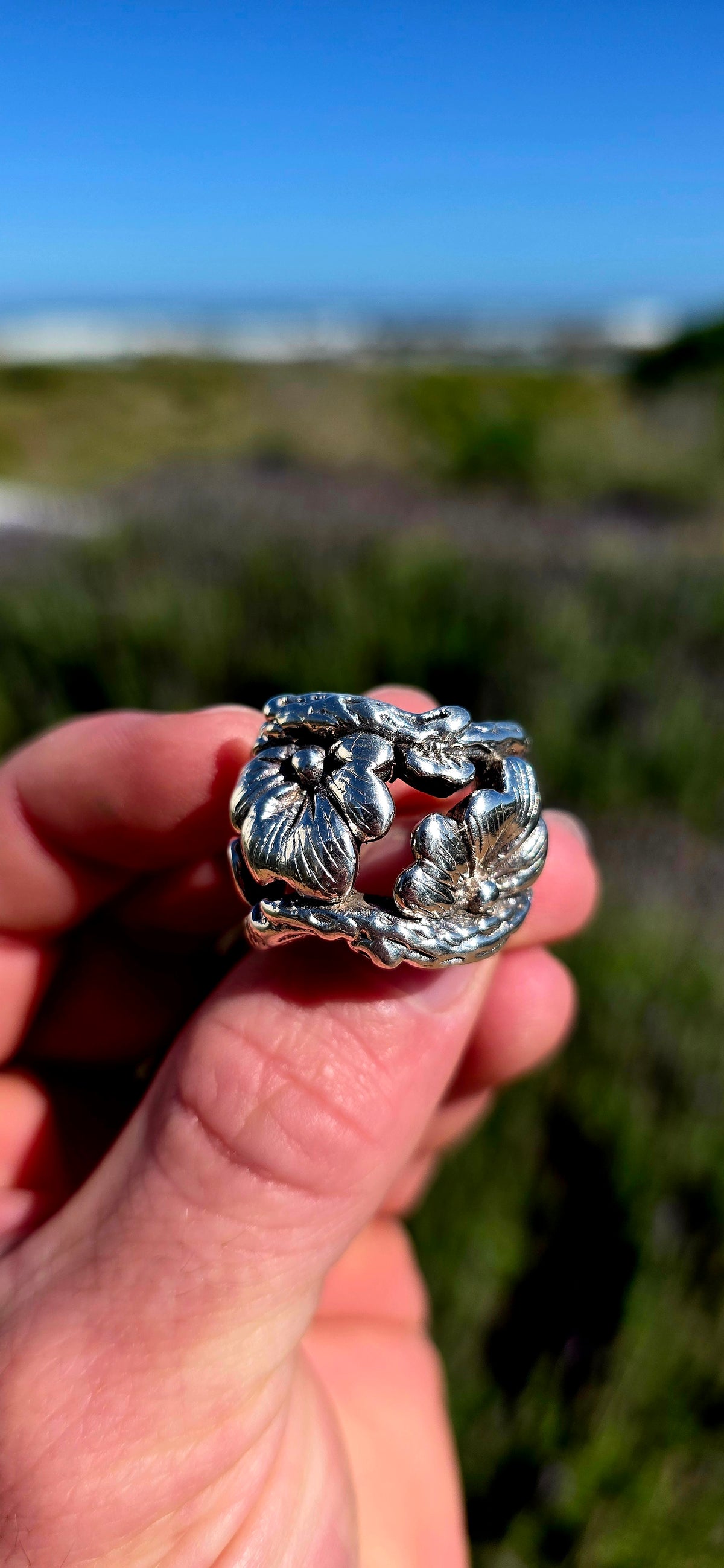 A seriously chunky sterling silver statement ring that looks like a piece of an enchanted woodland wrapped around your finger!