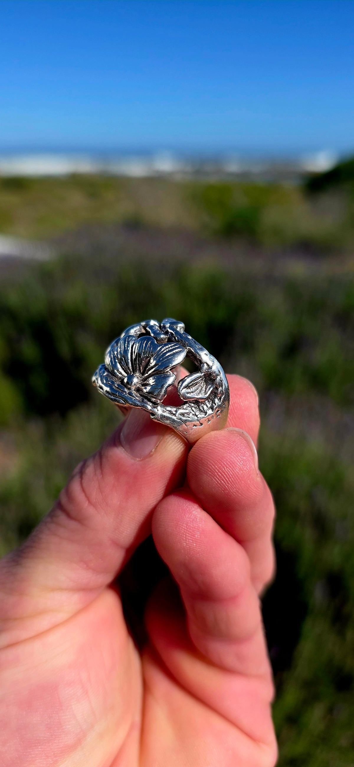 A seriously chunky sterling silver statement ring that looks like a piece of an enchanted woodland wrapped around your finger!