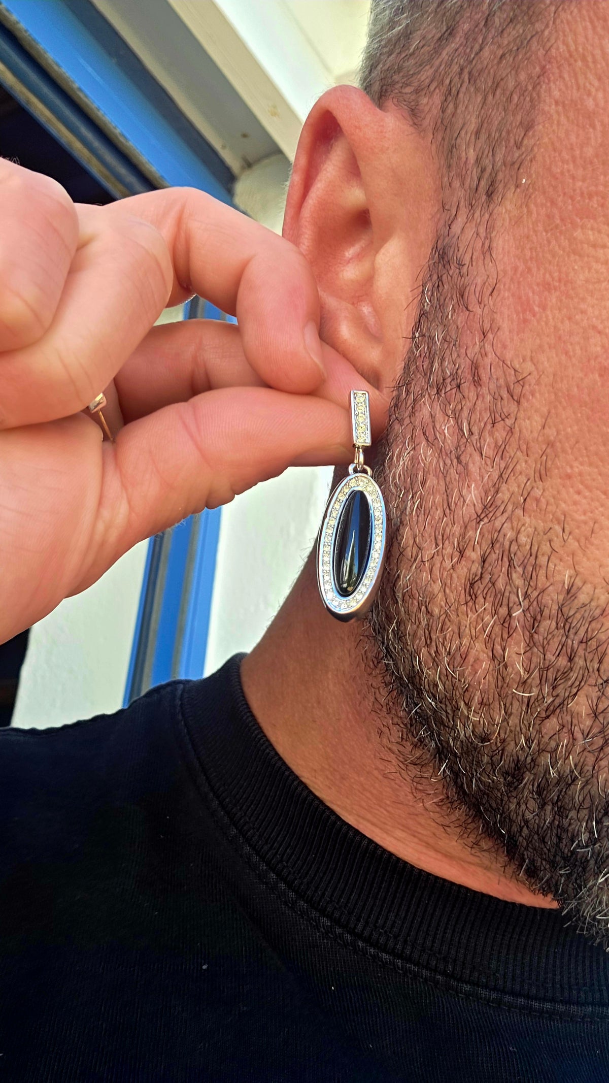 Beautifully crafted in sterling silver in a glamorous Art Deco Revival style, these high-end drop earrings have a rather clever secret — they are completely reversible!