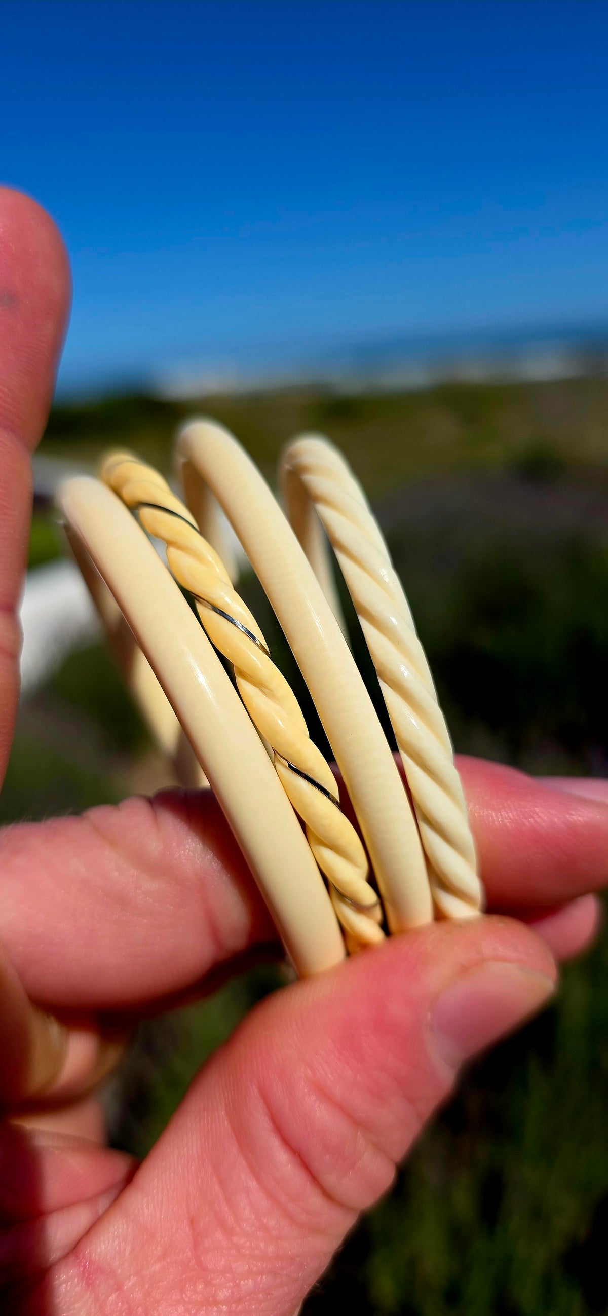 A lot of four antique hand-carved pre-ban ivory bangles, each with that wonderfully warm creamy tone and subtle character that comes with age.