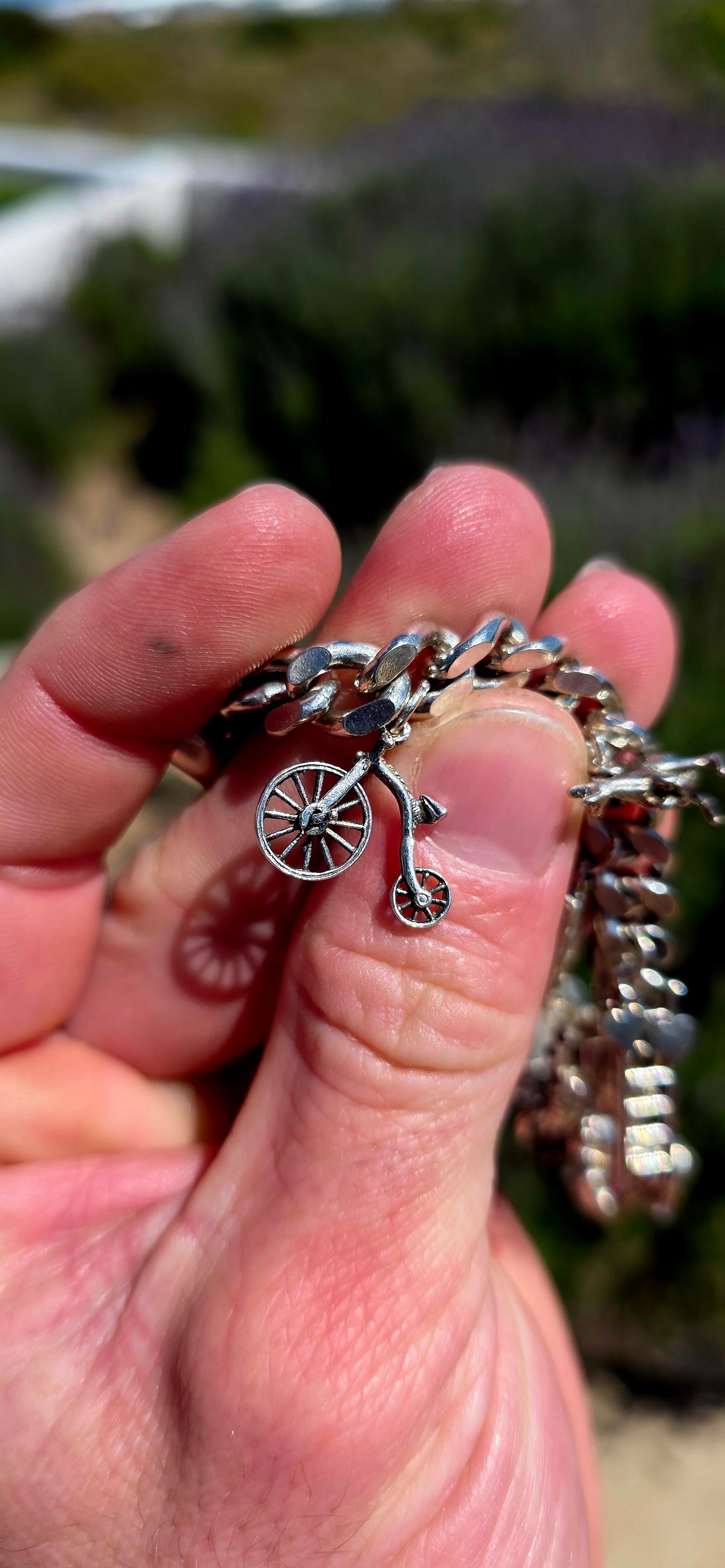 Now THIS is a proper old-school charm bracelet!! A marvellous vintage piece crafted around a beautifully substantial solid sterling silver curb-link bracelet, absolutely loaded with 13 individual sterling silver charms.