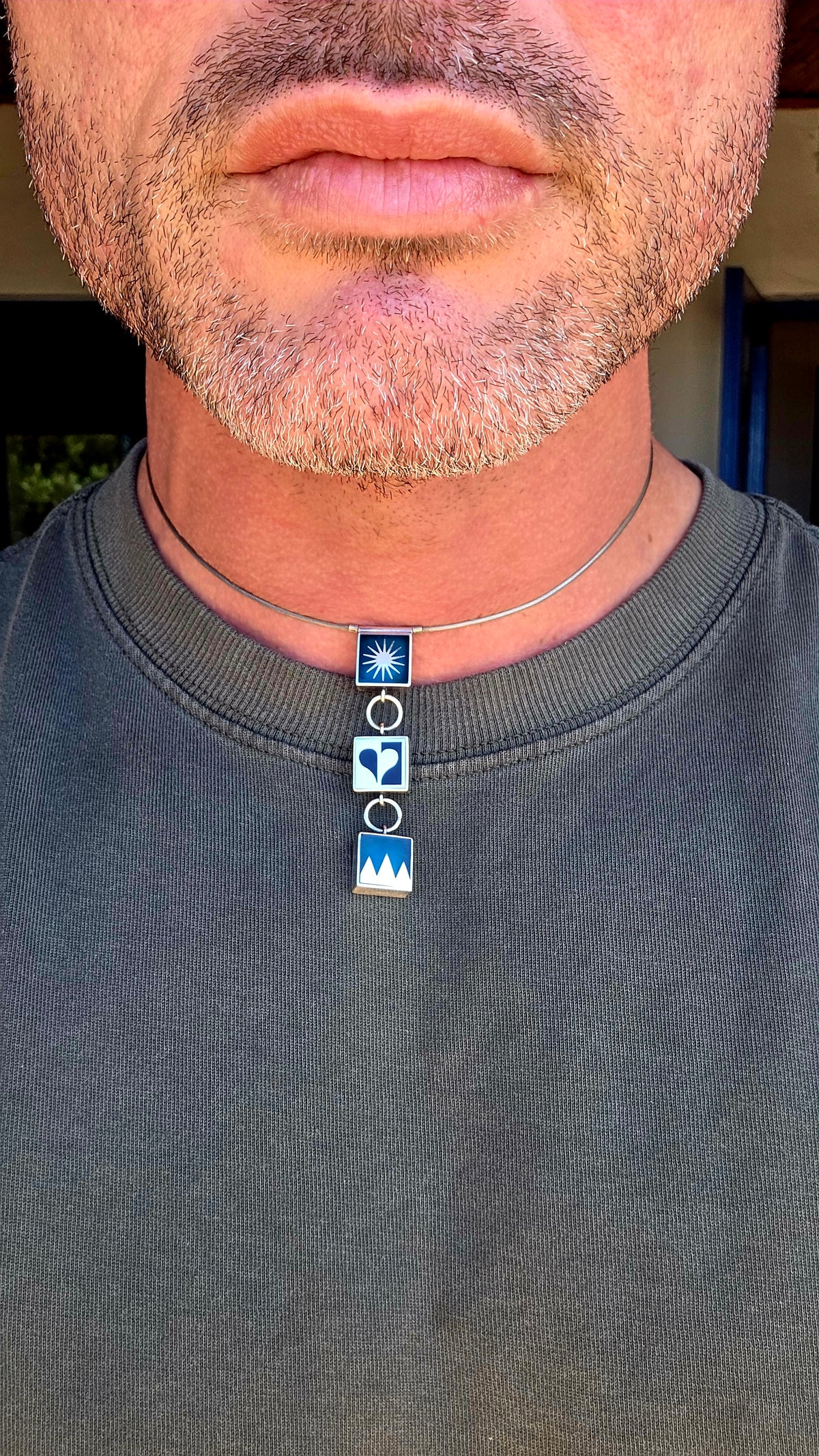 A wonderfully artistic and contemporary statement necklace by jewellery designer Victoria Varga, combining bold geometric shapes, beautiful symbolism and striking colour!