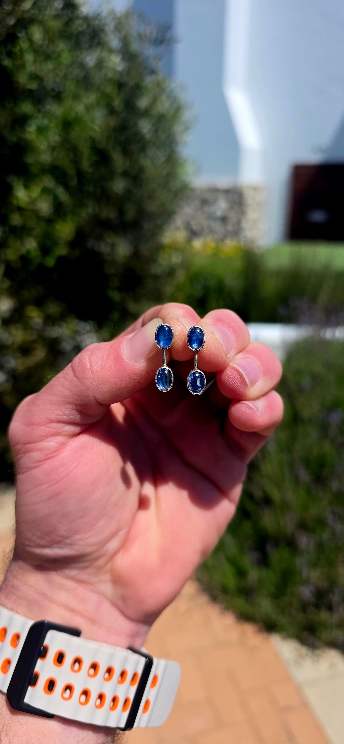A gorgeous pair of contemporary sterling silver and natural blue kyanite earrings, combining sleek modernist design with the most beautiful ocean-blue gemstones!