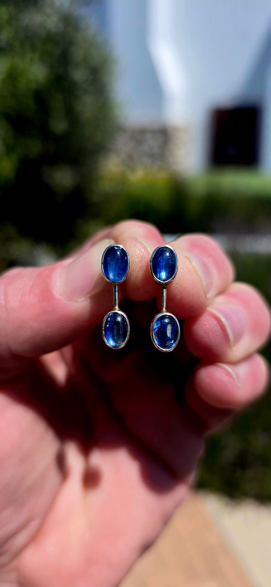 A gorgeous pair of contemporary sterling silver and natural blue kyanite earrings, combining sleek modernist design with the most beautiful ocean-blue gemstones!