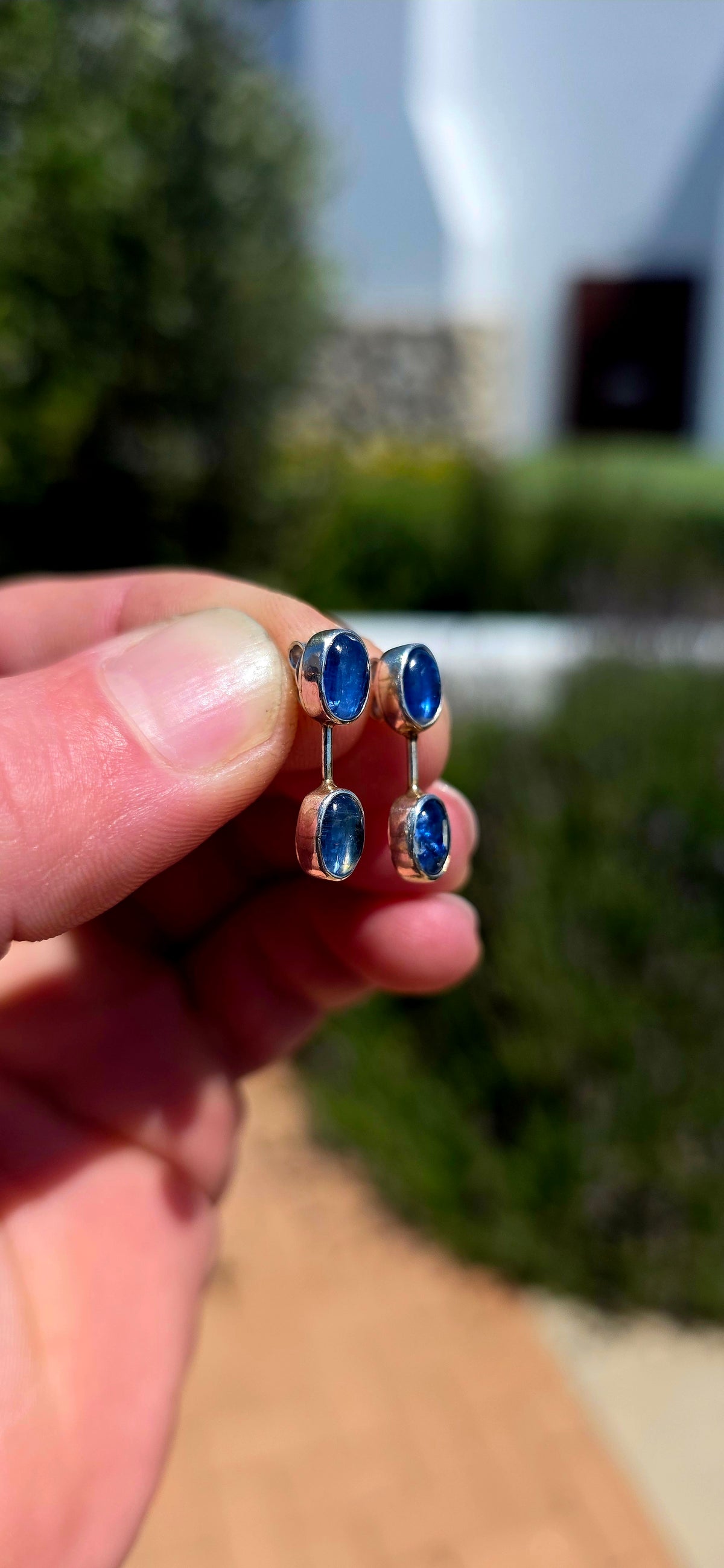 A gorgeous pair of contemporary sterling silver and natural blue kyanite earrings, combining sleek modernist design with the most beautiful ocean-blue gemstones!