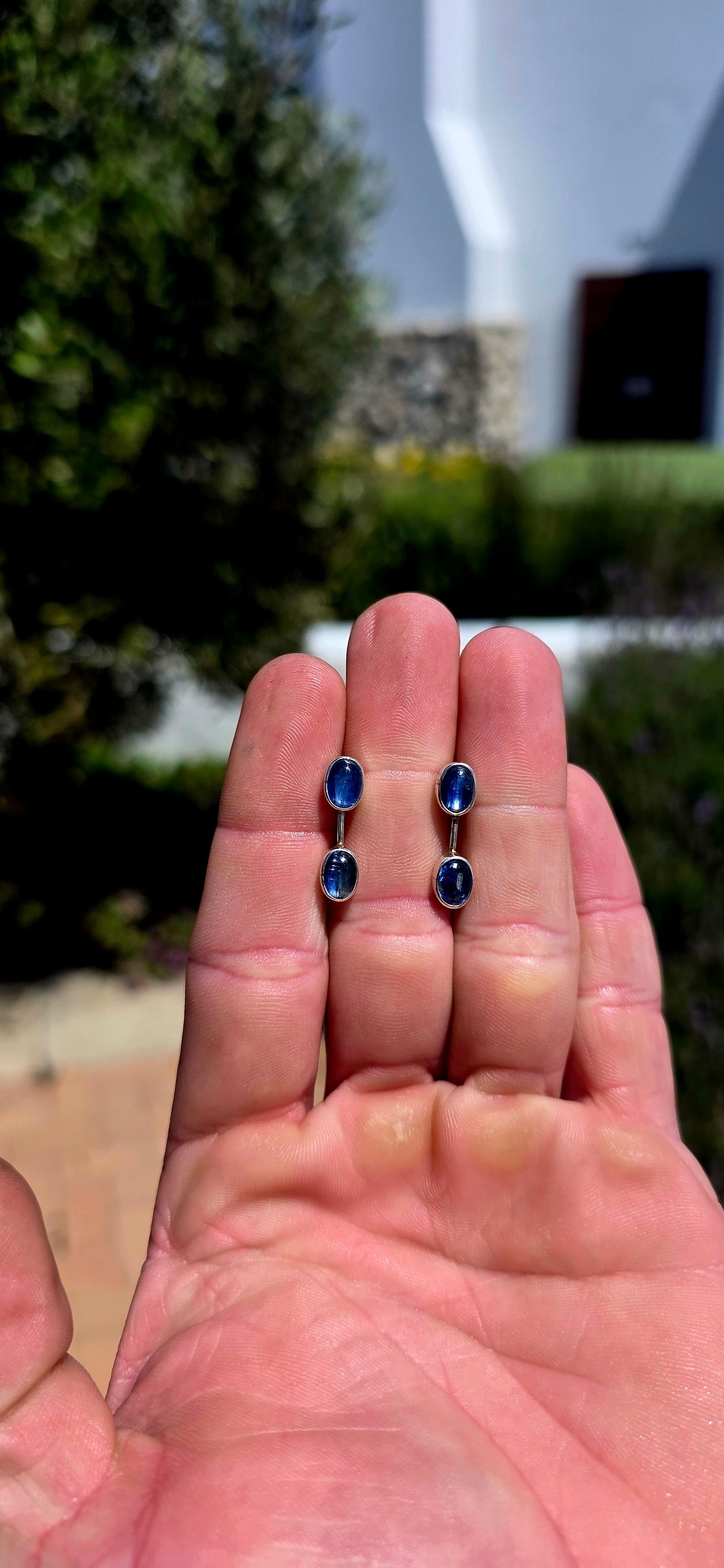 A gorgeous pair of contemporary sterling silver and natural blue kyanite earrings, combining sleek modernist design with the most beautiful ocean-blue gemstones!