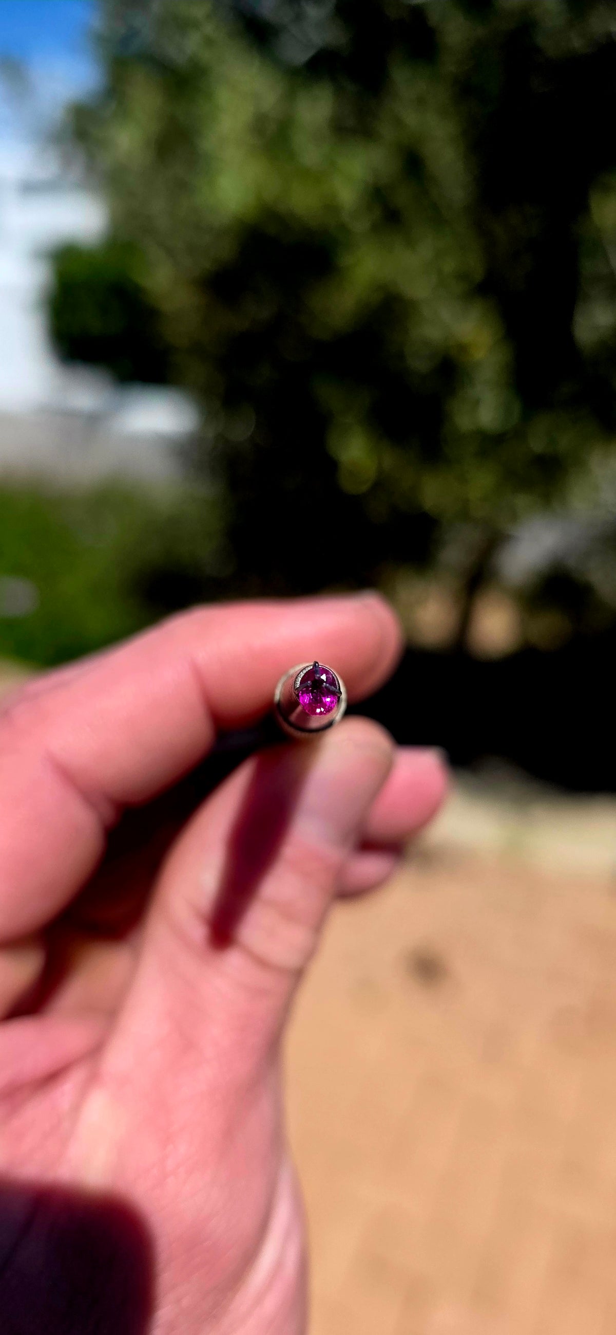 A beautiful matching pair of unset oval-cut rubellite tourmaline gemstones, displaying the most fabulous, vibrant raspberry-pink to reddish-pink colour!