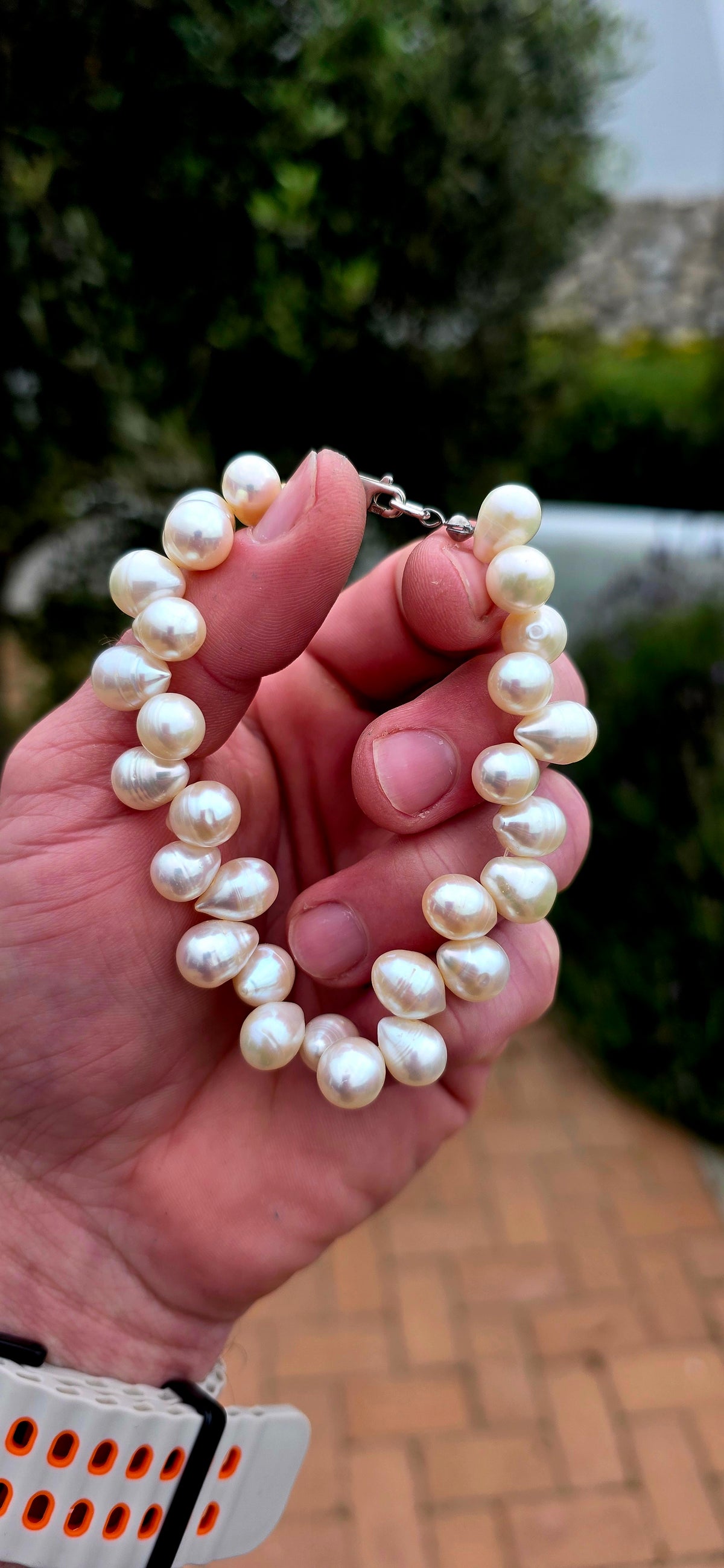 A beautifully elegant freshwater cultured pearl bracelet featuring generously sized, lustrous pear-shaped pearls, each displaying its own wonderfully organic shape and character!