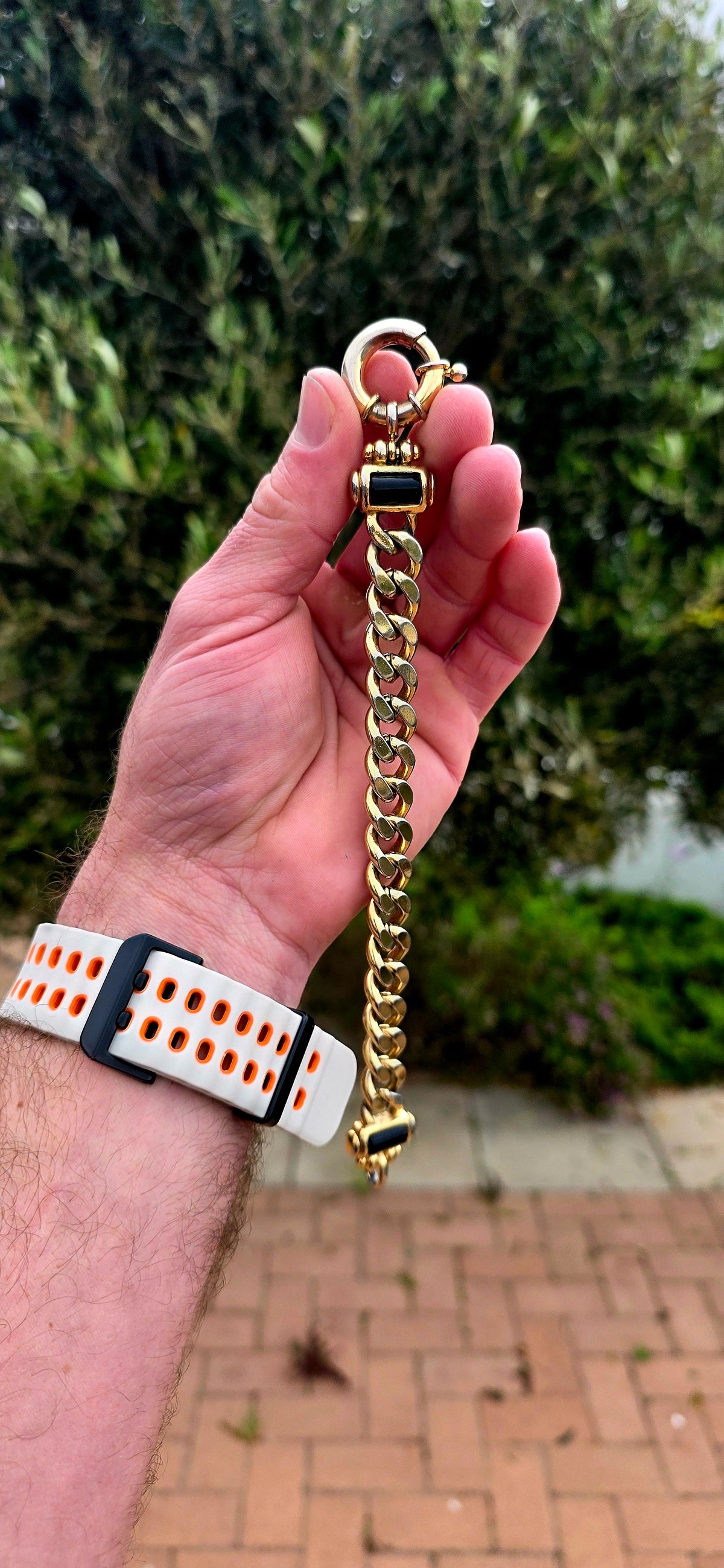 A fabulous vintage 1990s chunky costume bracelet crafted in rich yellow gold plating, featuring oversized, beautifully polished curb links that create a bold, luxurious statement on the wrist!